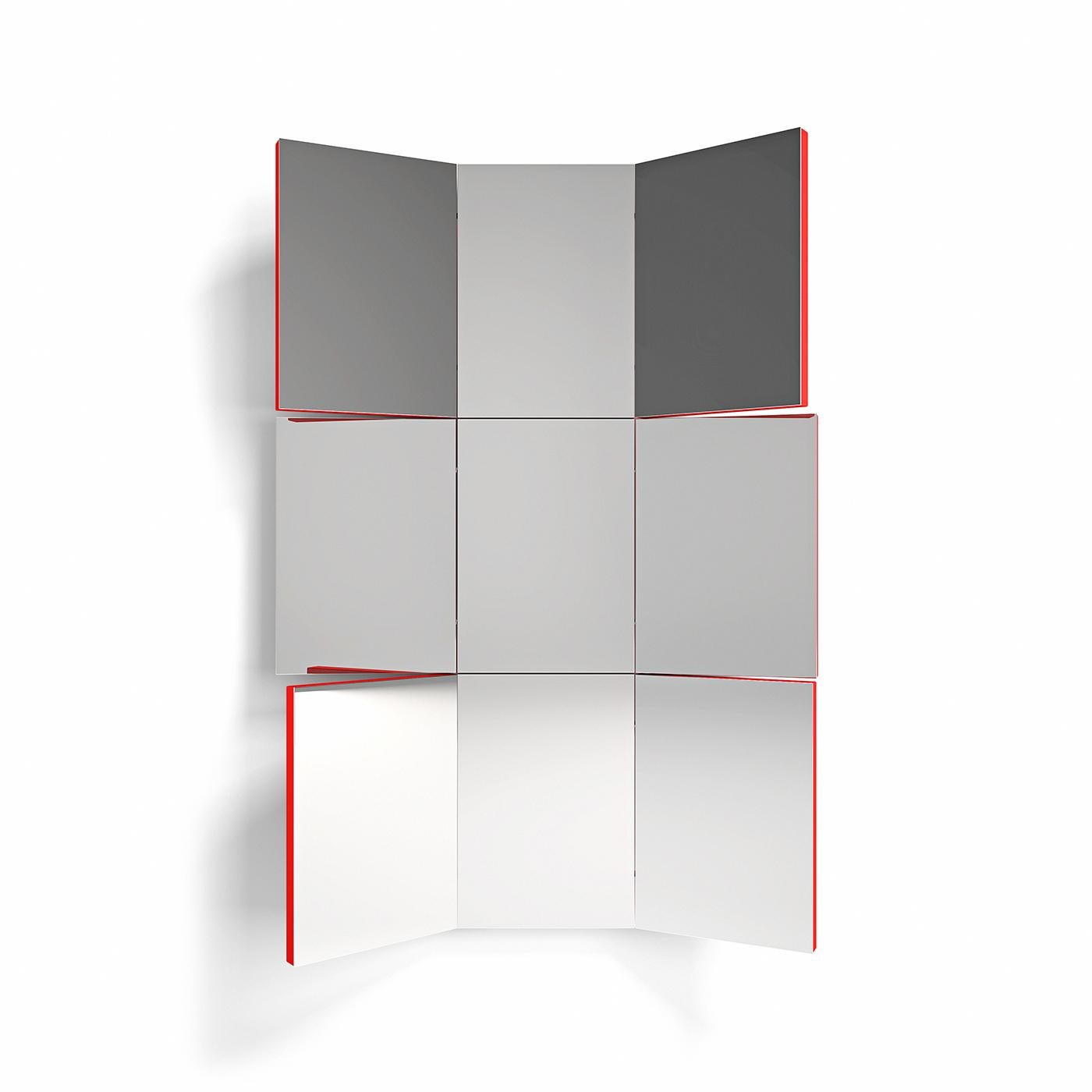 This leading-edge mirror flaunts a smart aesthetic that elevates it to a contemporary artwork. The red-lacquered wooden structure is linked to the nine rotating panels crafted of stainless steel and made perfectly reflective thanks to a uniform,