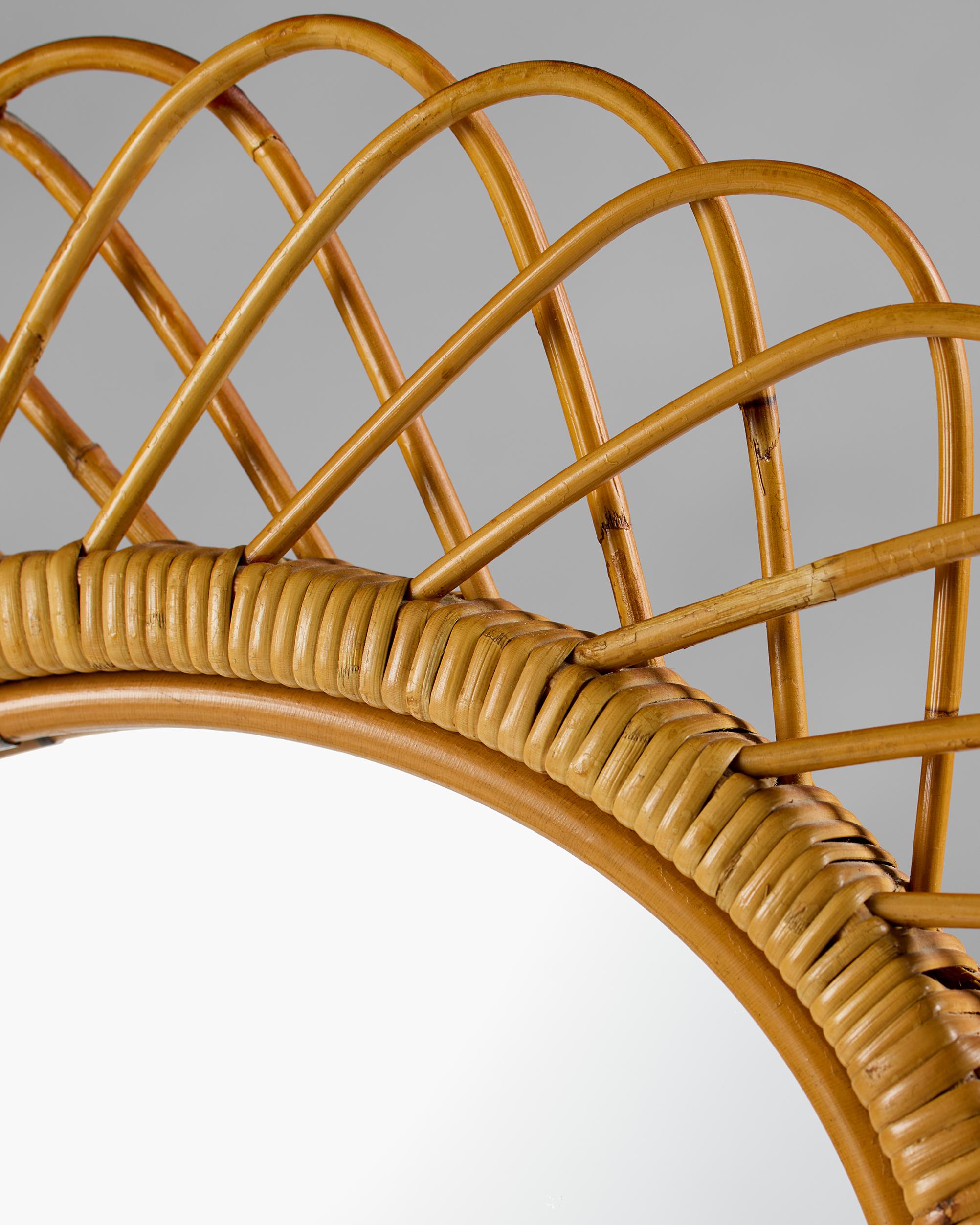 Mirror, anonymous
Sweden, 1900.

Cane and glass.

H: H: 79 cm / 2' 7