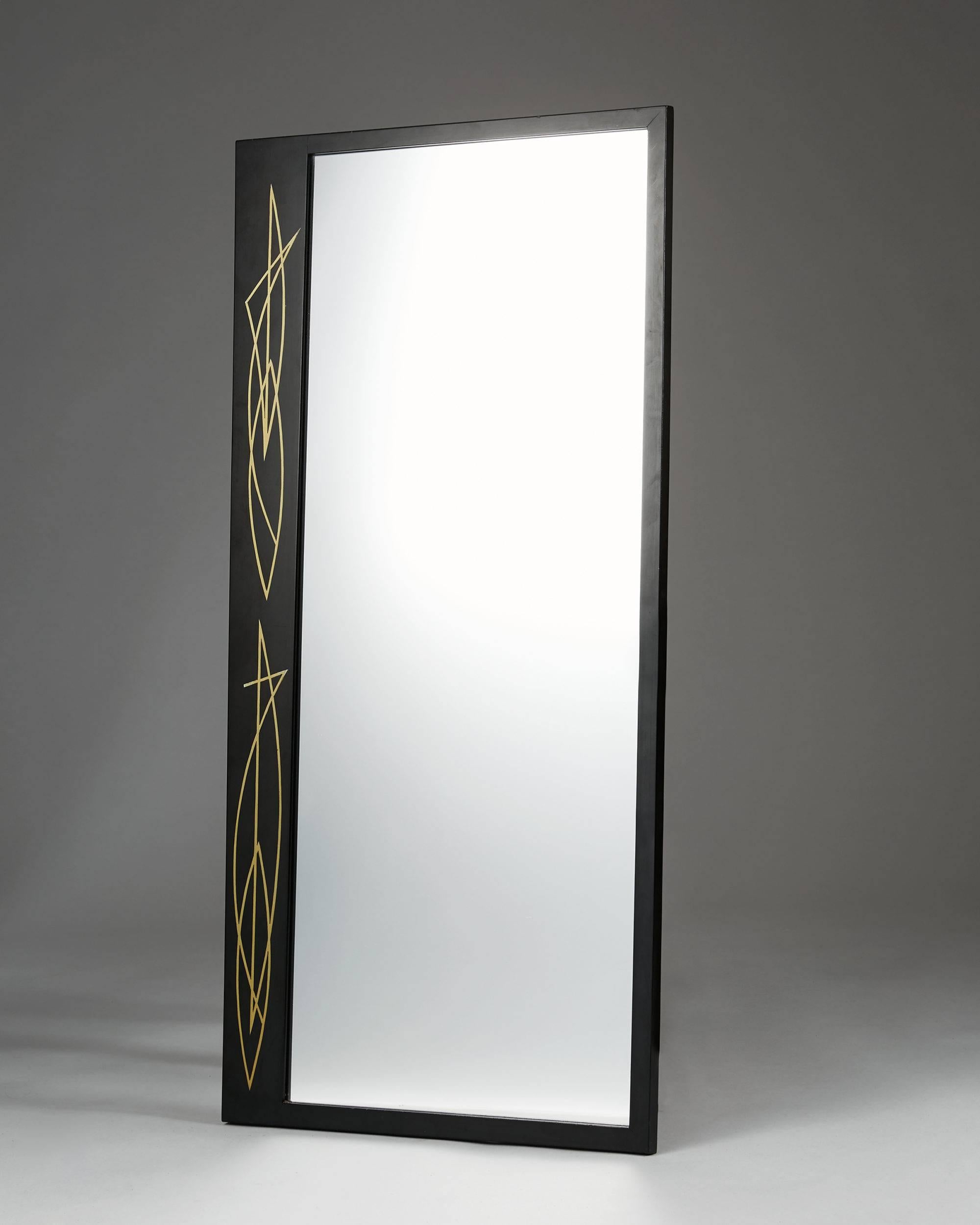 Mirror anonymous, 
Sweden, 1950s.

Lacquered wood with brass inlay.

Measures: H 96 cm/ 37 3/4''
W 48 cm/ 19''.