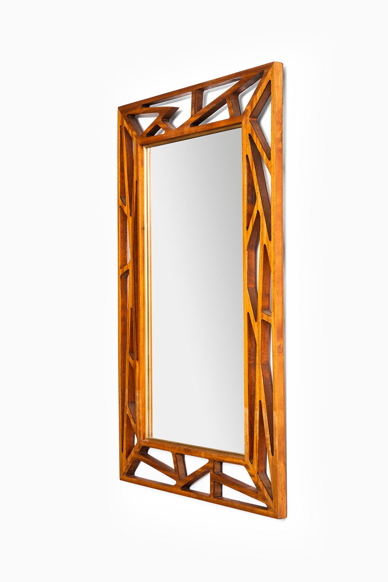 Very rare mirror attributed to Yngve Ekström. Produced by Eden spegel in Sweden.