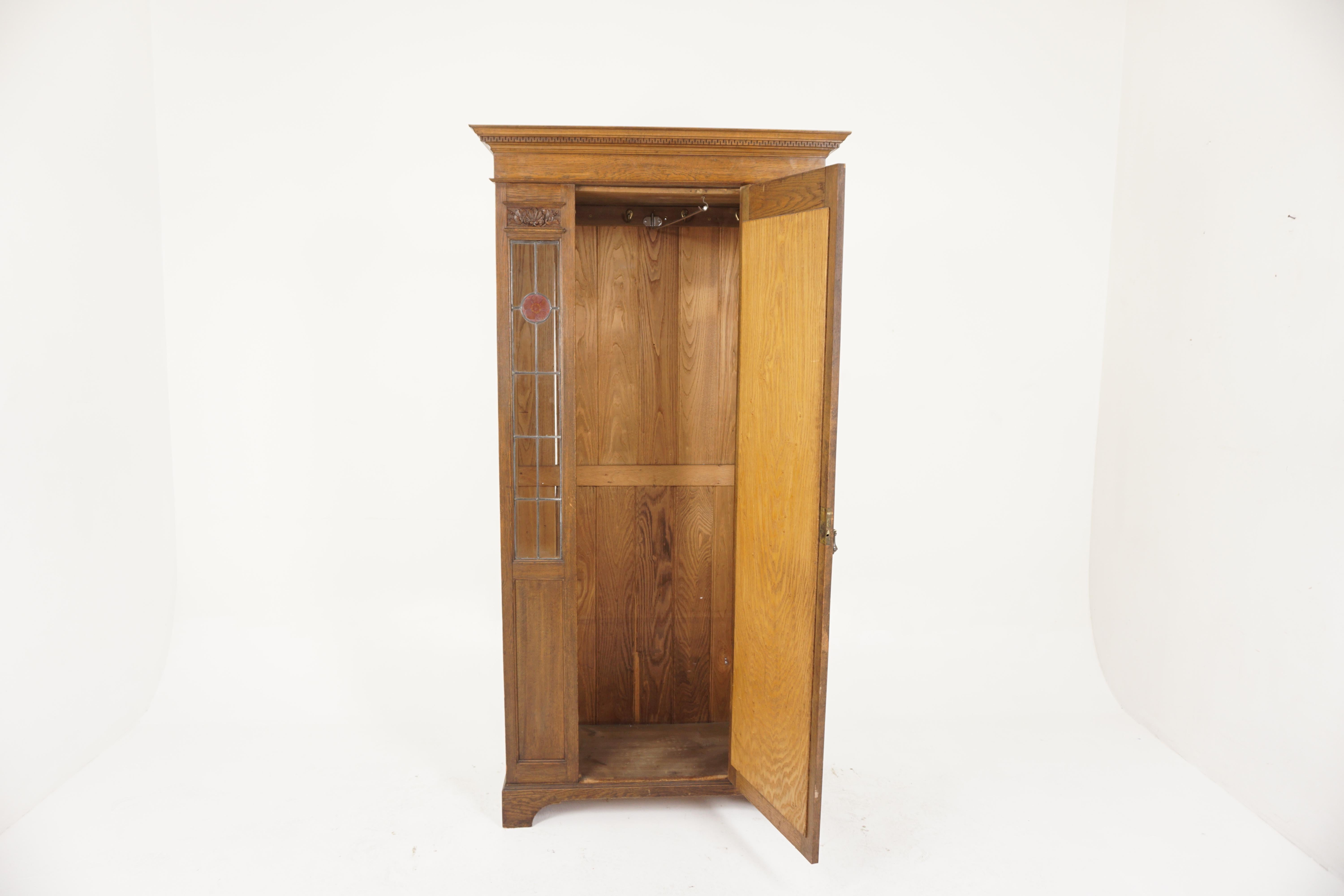 Antique Oak Arts and Craft mirror back hall armoire, wardrobe, closet, leaded glass, Scotland 1910, H247

Scotland 1910
Solid Oak
Original Finish
Dentil Cornice on top with single oval bevelled mirror on door
Flanked by a pair of leaded glass