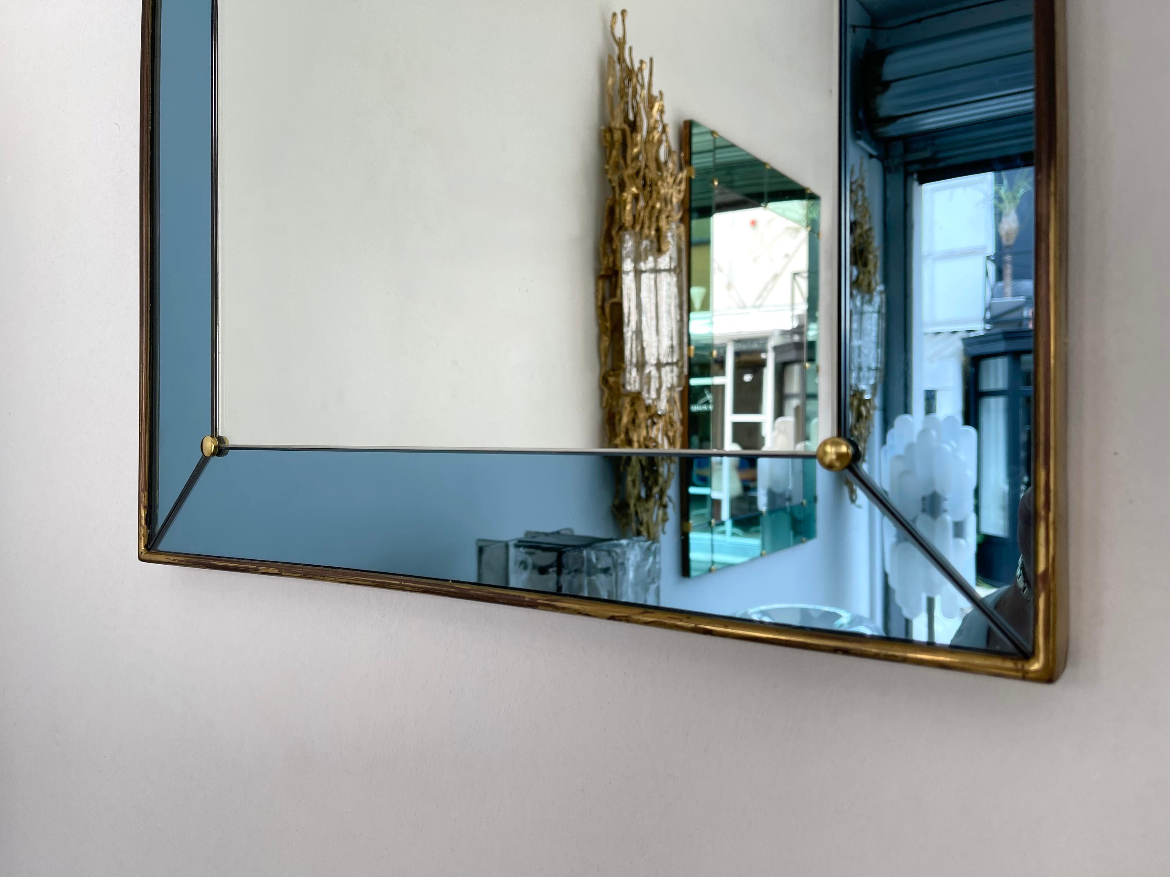 Mirror blue with brass frame by Cristal Art. Famous manufacture like Fontana Arte.