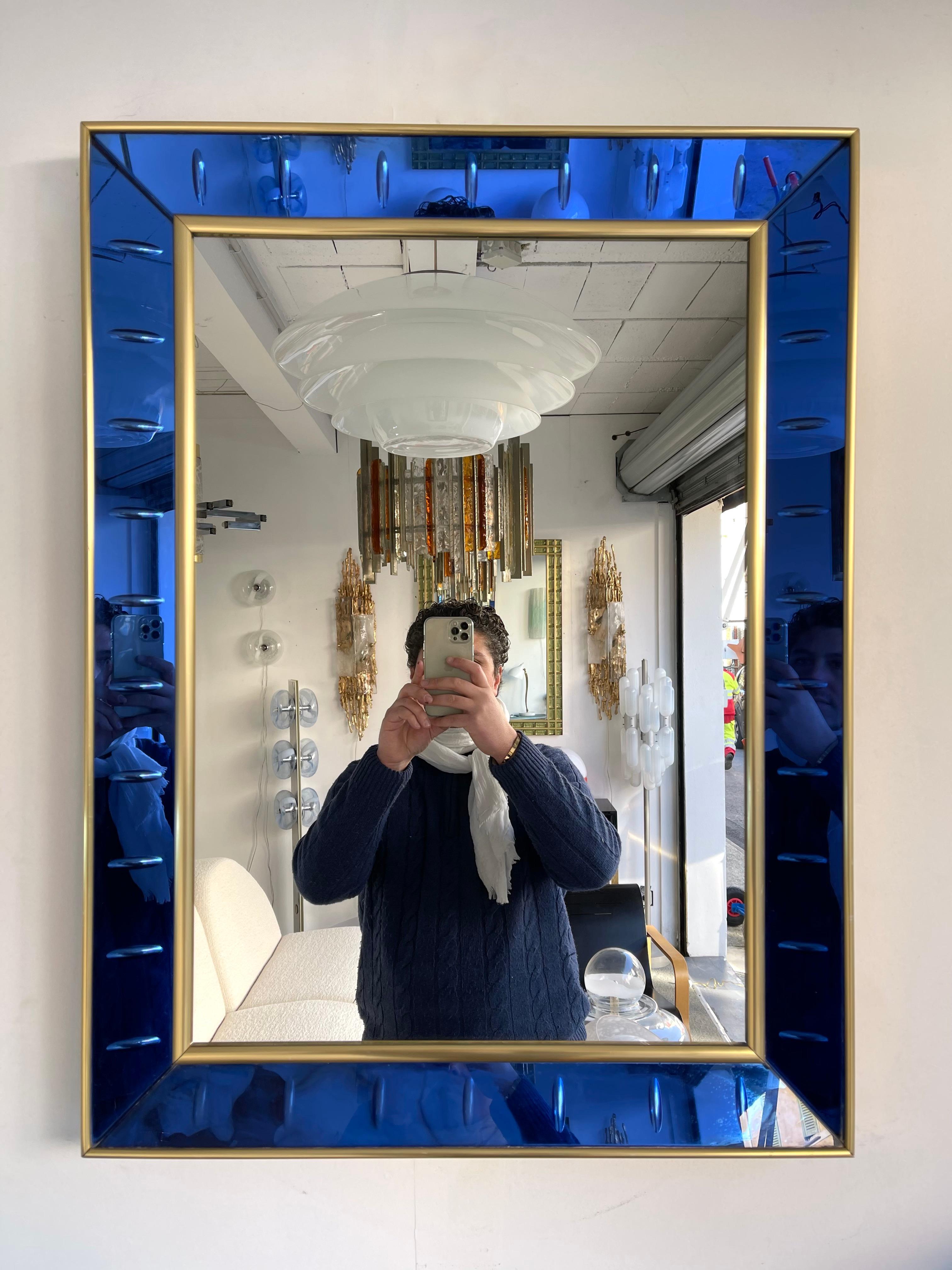blue glass wall mirror
