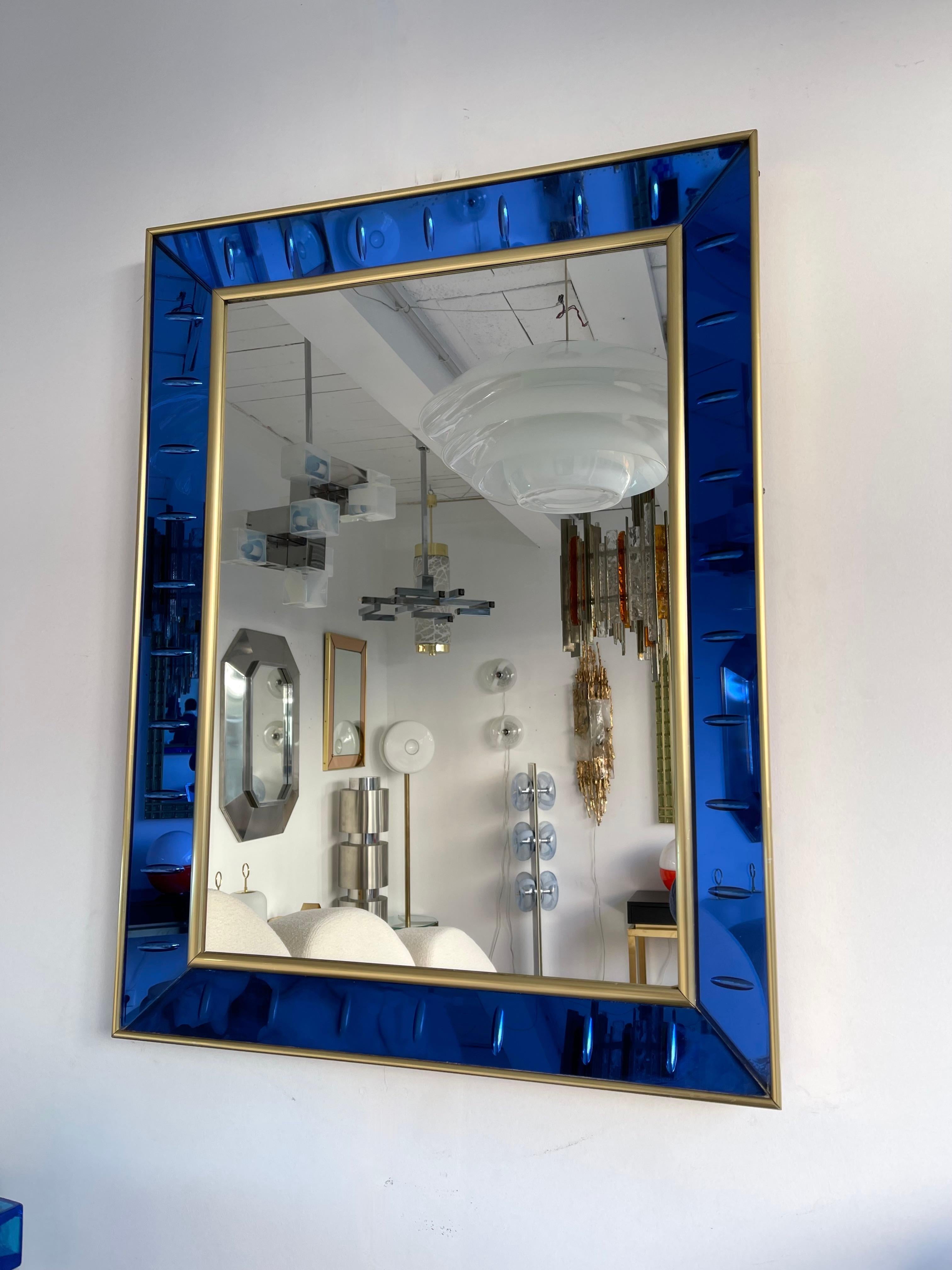 blue framed wall mirror