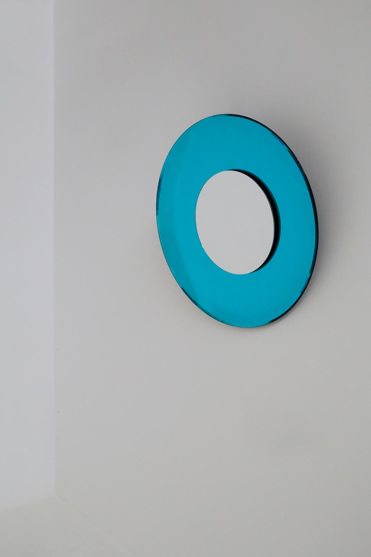 Scenographic wall mirror of contemporary manufacture made by Effetto Vetro in 2010. In style Fontana Arte. They are limited edition. Its semi-circular structure creates a play of spectacular reflections. It has been silvered manually and mounted on