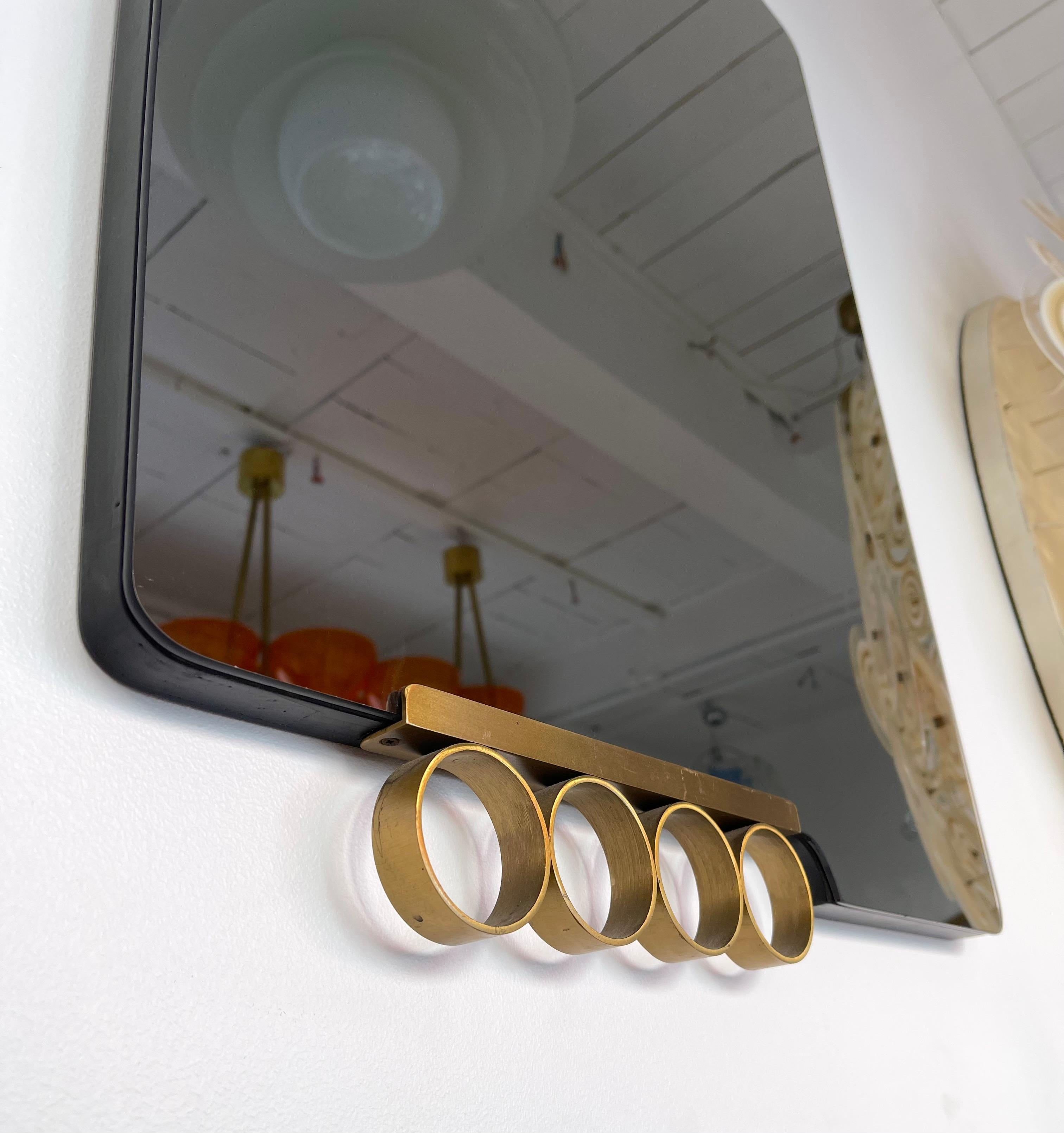 Pair of Mid-Century Modern Space Age wall mirrors brass disc by the italian design manufacture Modernindustria. Nice gold tinted mirror. Famous design like Romeo Rega, Tommaso Barbi, Sandro Petti for Maison Jansen, Willy Rizzo, Mario Sabot.

2