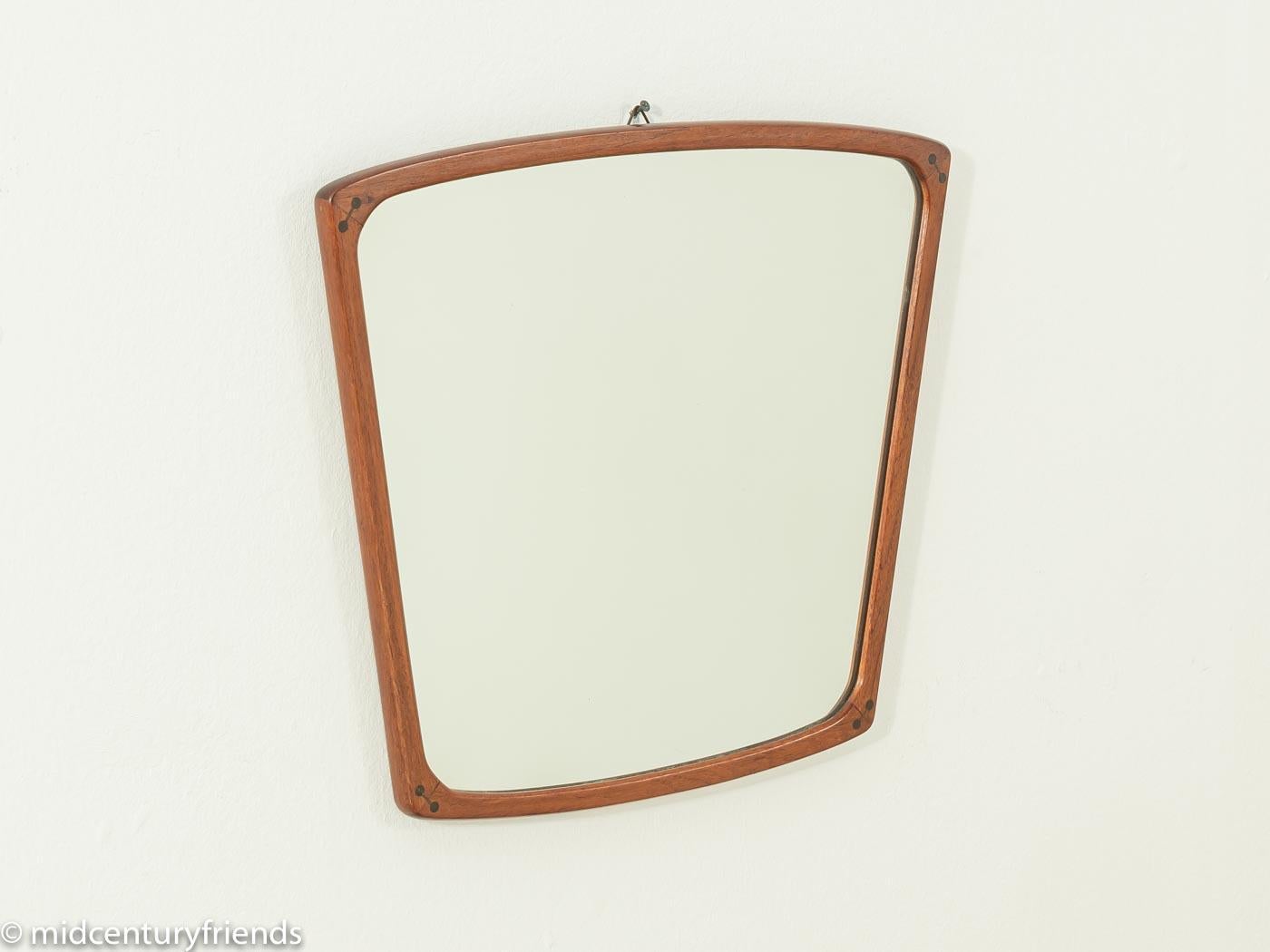 Classic mirror from the 1960s with a high-quality solid wood frame in teak. Made in Denmark, manufacturer: Aksel Kjersgaard. 
