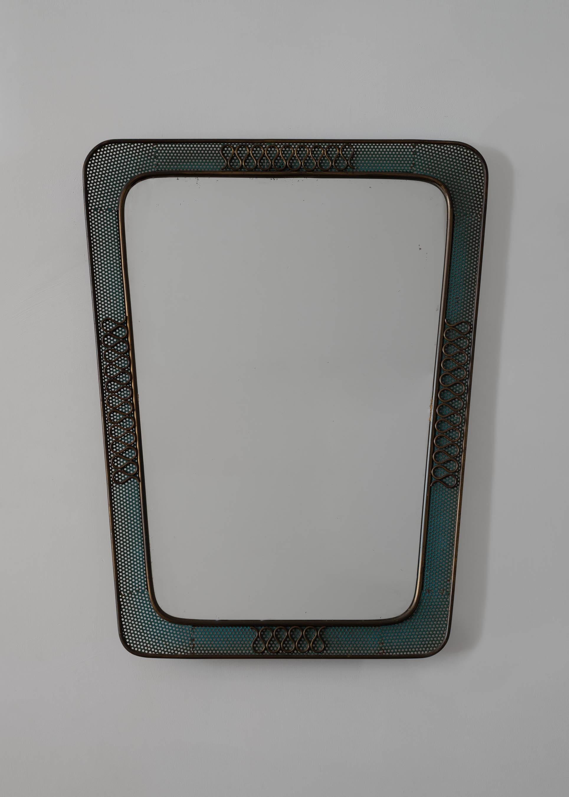 Italian brass and perforated metal mirror by Carlo Erba. Made in Italy circa 1950s.