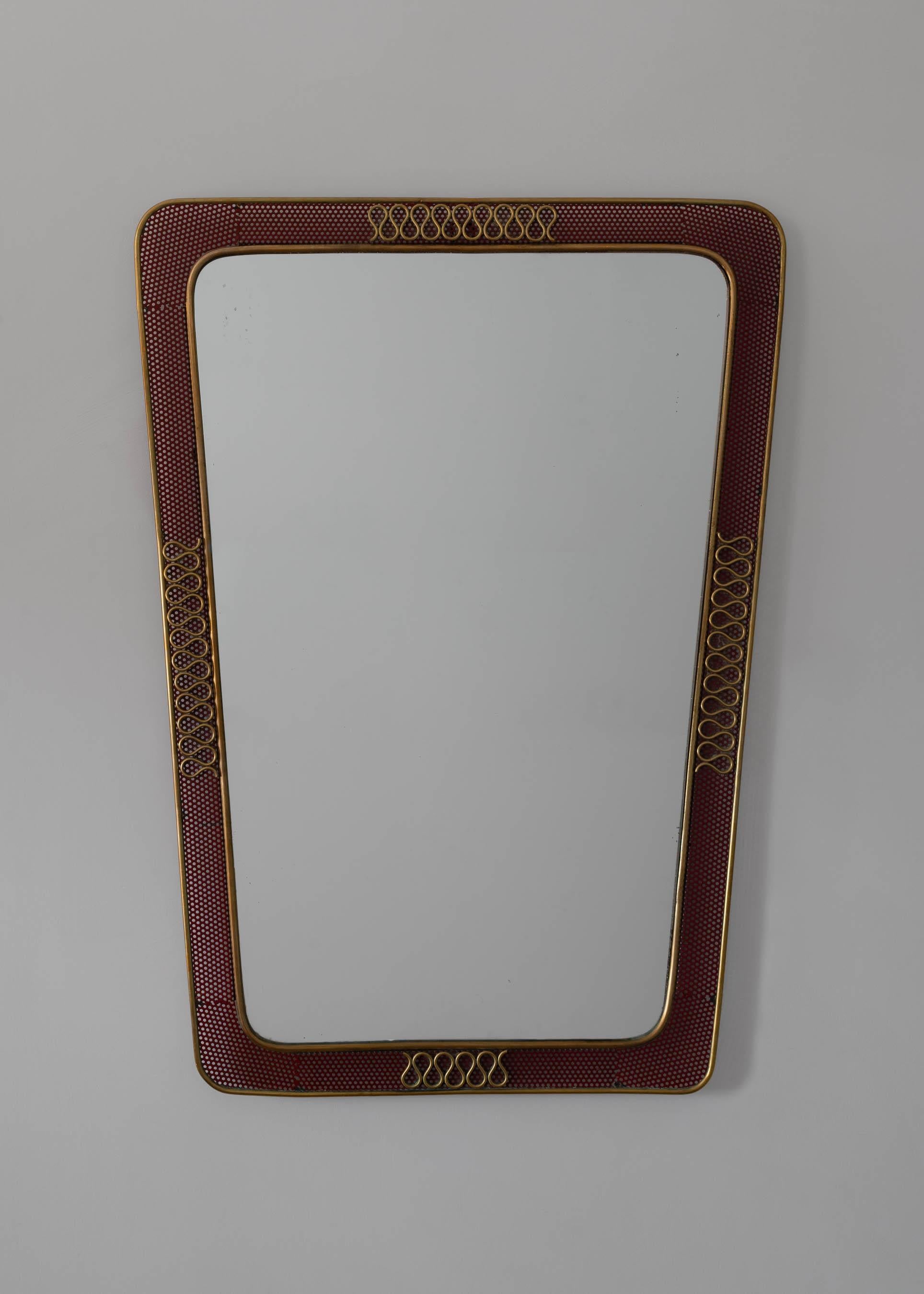 Brass and perforated metal mirror by Carlo Erba. Made in Italy circa 1950s.