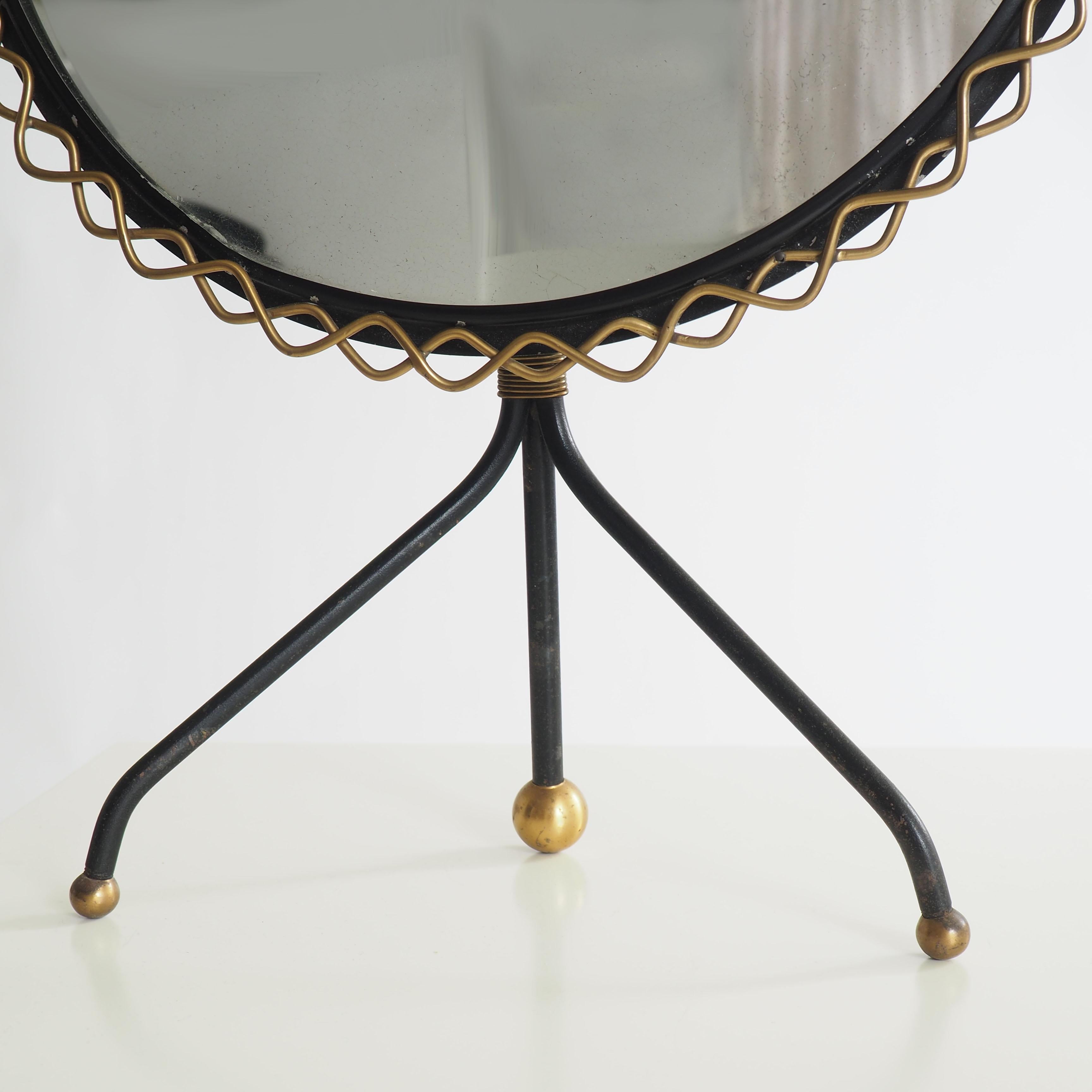 Very rare table mirror in brass and metal by Hans-Agne Jakobsson. Made in his own workshop in the 1950s.