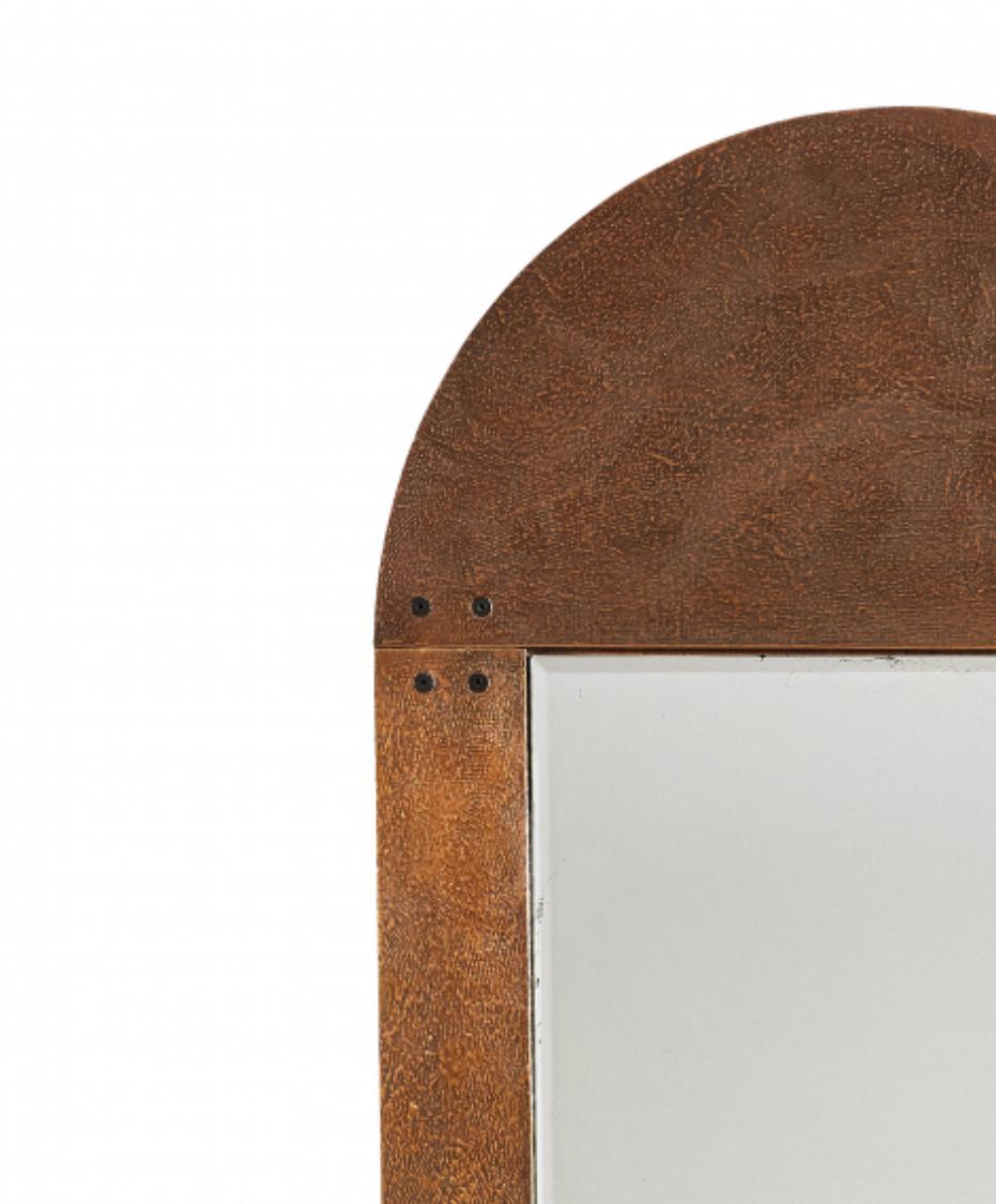 This mirror has an interesting textured surface, a hallmark that the Italian designer Lorenzo Burchiellaro is known for. Most of his objects show characteristics of textured surfaces, made via engravings, scratches and etchings.
The copper thus