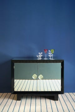 Meuble de rangement miroir par Jacques Adnet