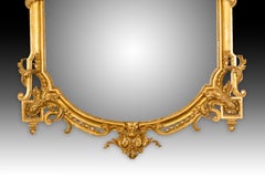 Mirror. Carved and gilded mother. 20th century.