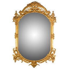 Mirror. Carved and gilded mother. 20th century.