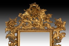 Mirror. Carved, gilded and polychrome wood; 18th century.