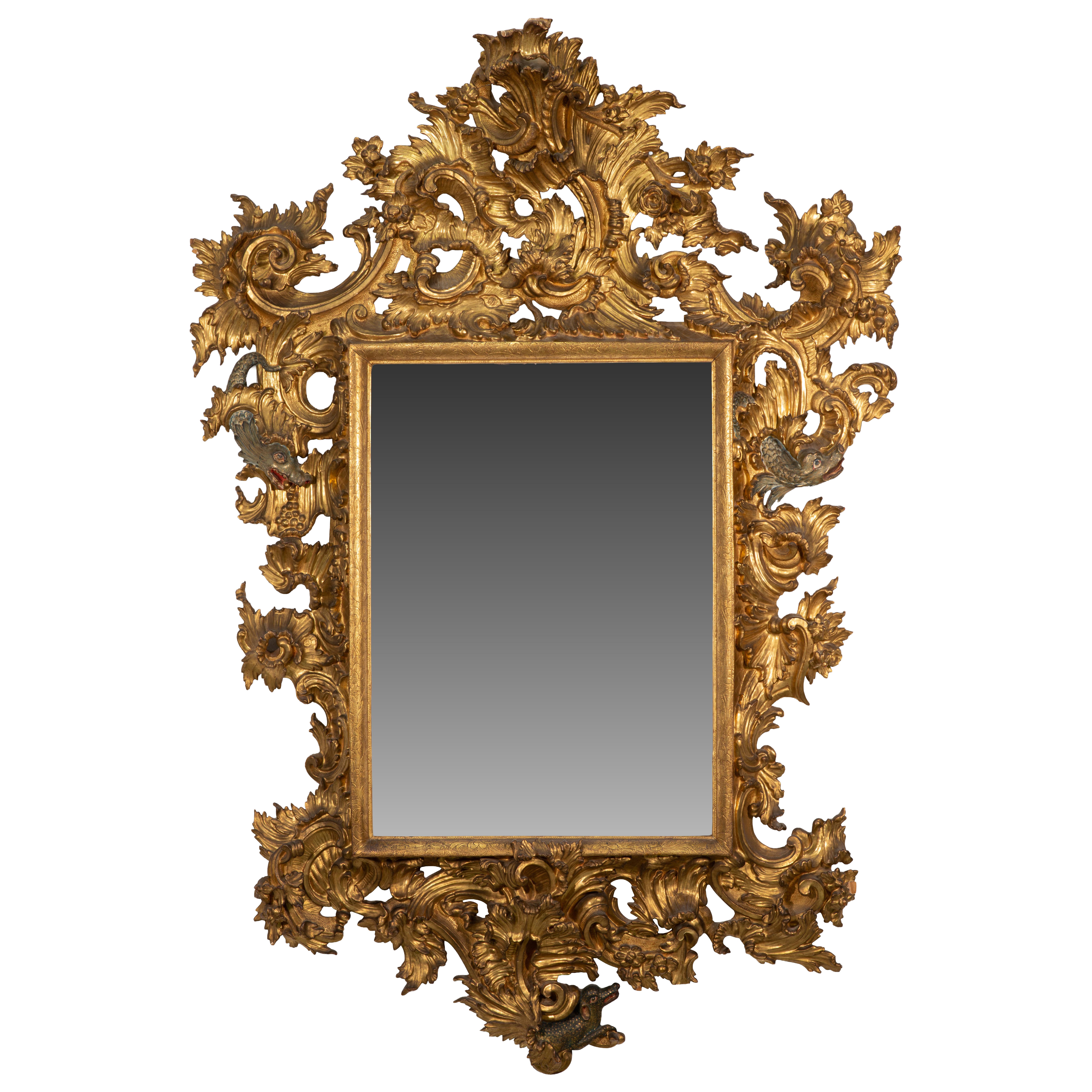 Mirror. Carved, gilded and polychrome wood; 18th century.