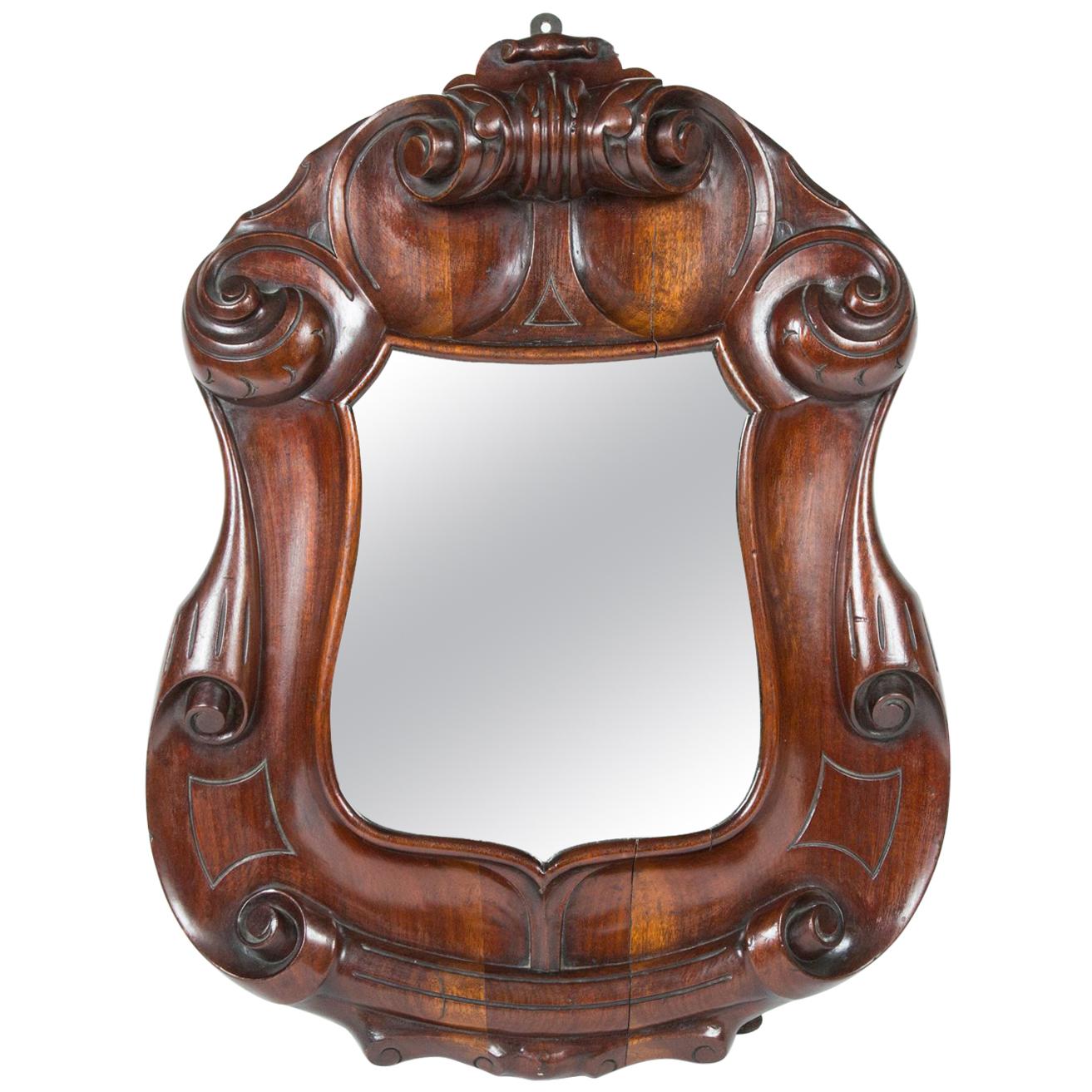 Mirror Carved in the Form of a Shield