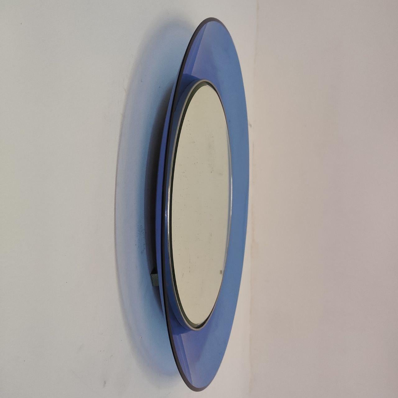 Miroir bleu cobalt de Max Ingrand pour Fontana Arte modèle 1669, Italie, milieu du siècle dernier
Miroir modèle 1669 de Max Ingrand pour Fontana Arte, un chef-d'œuvre du design italien des années 1960. Cette pièce extraordinaire présente un miroir