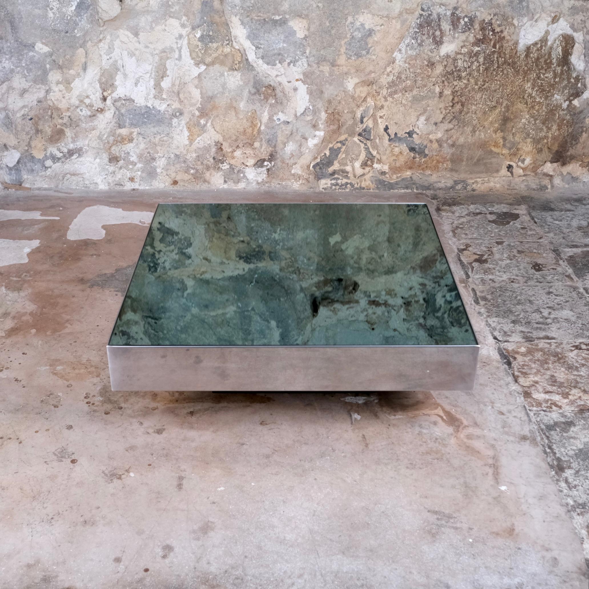 Beautiful square mirror coffee table by Willy Rizzo for Cidue, made in Italy, 1970s.
Blue shade mirror top, chromed steel edges, mirror effect, and black laminate wood base.
Good condition overall, few scratches on top, one lengthwise chipped angle