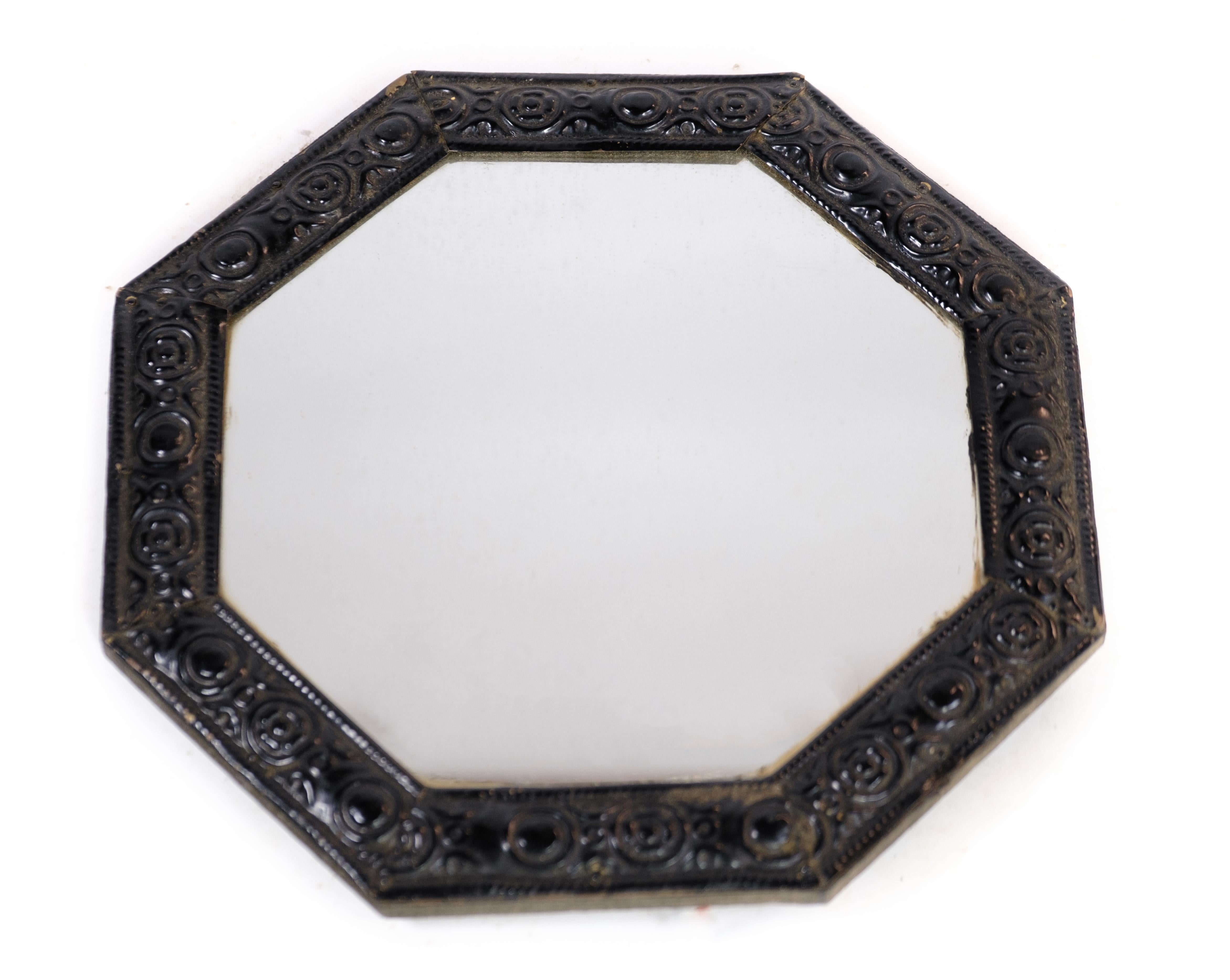 Antique mirror in dark wood from around the 1890s.
Dimensions in cm: H:30.5 W:30.5

This product will be inspected thoroughly at our professional workshop by our educated employees, who assure the product quality.