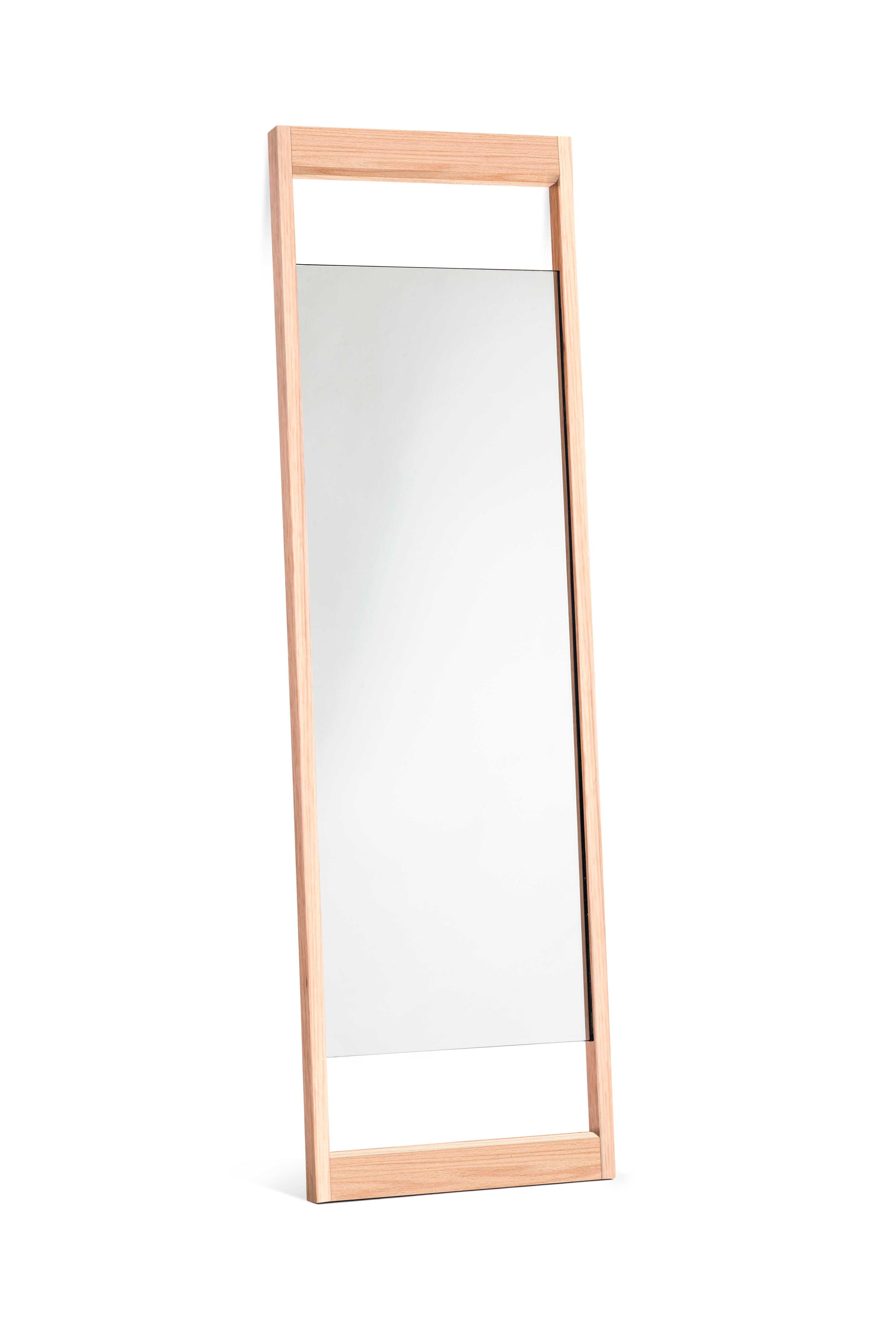 Introducing the Espejo DEDO, a Mexican Contemporary Wall Mirror designed by Emiliano Molina for CUCHARA. This mirror features a simple yet elegant construction, aiming to seamlessly blend with spaces and enhance their sense of openness and