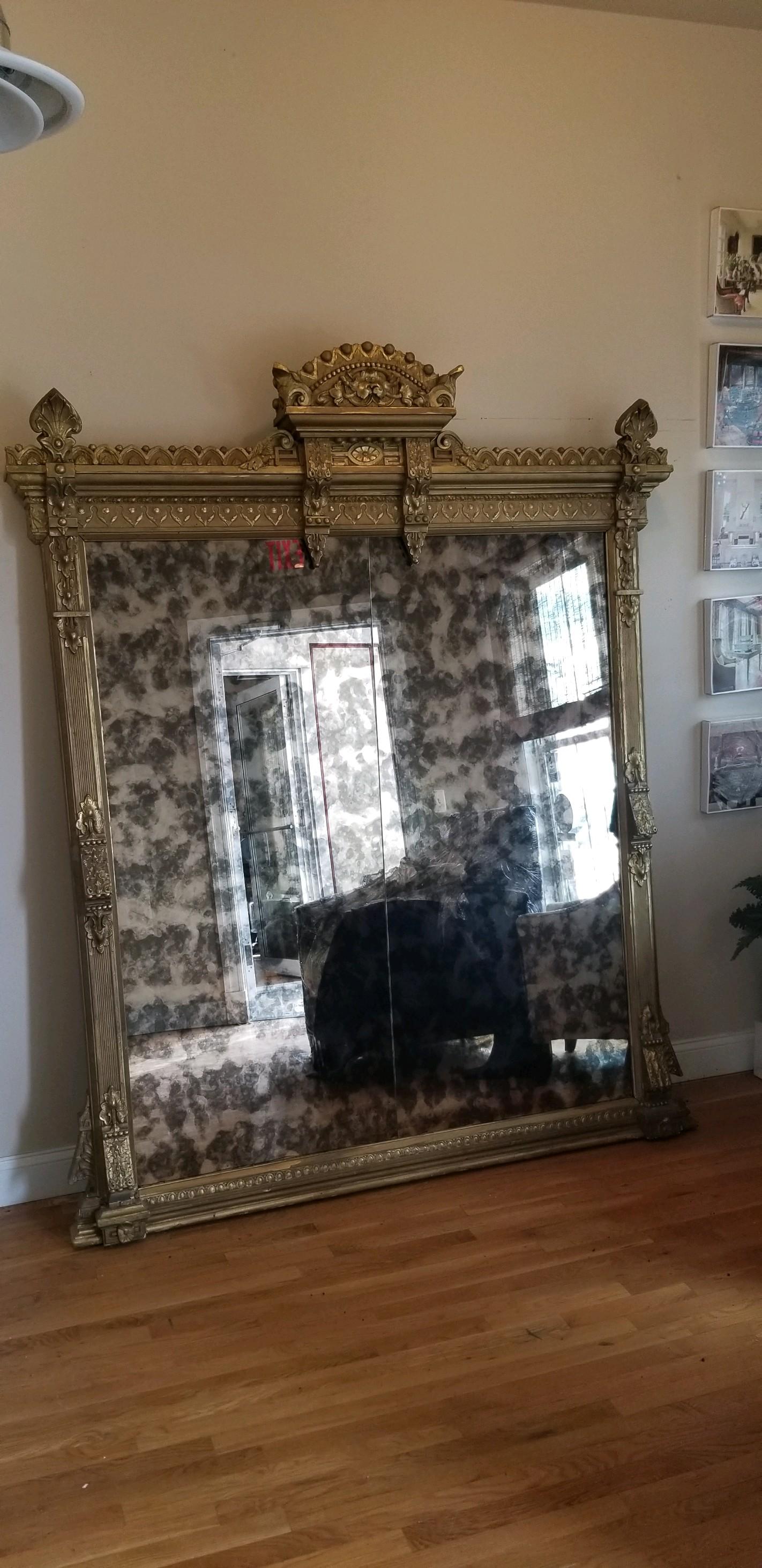 Fabulous pier mirror from the Victorian era. The mirror has been replaced as it would have been originally installed with a vertical seam. The detail is luscious and would be a focal point in any room be it traditional, contemporary or even in a