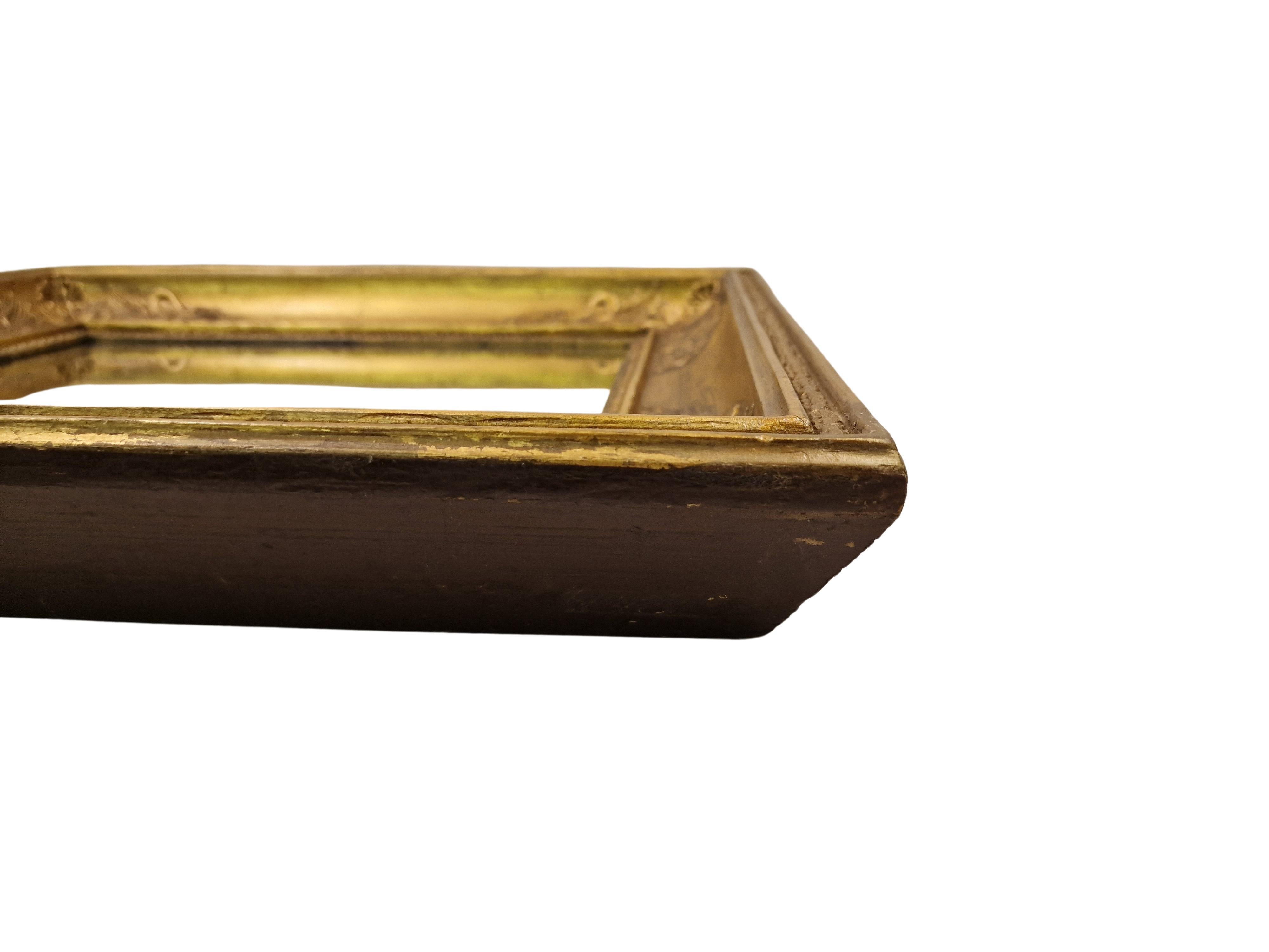 Wonderful wall mirror from the Empire period, around 1820, made in Vienna, Austria, Europe. 

The mirror is in impressive good condition, only the mirror plate has been renewed to enable it to be used. 
This gilt mirror, circa 200 years old, has