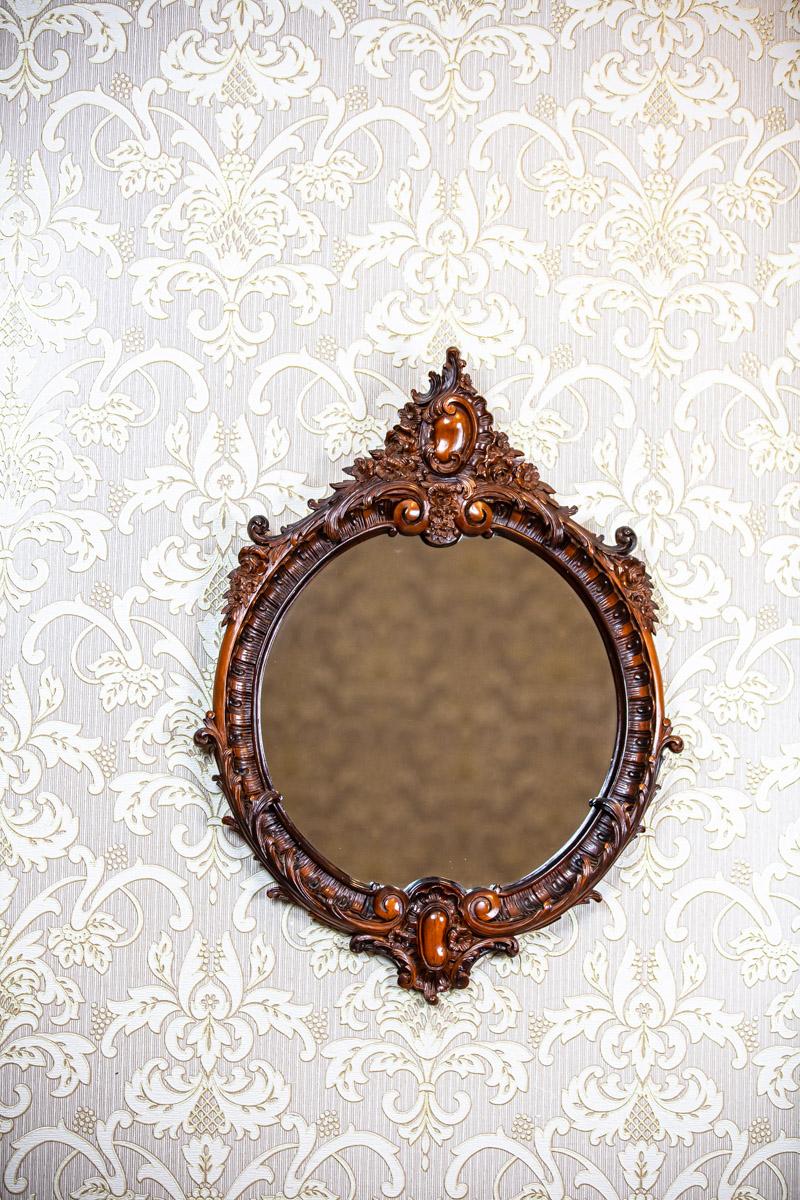 Rococo Revival Type Mirror From the Late 20th Century in Decorative Wood Frame

We present you a modern round mirror in a wooden frame stylized as Rococo Revival.
It is from the late 20th century.

This mirror is in particularly good condition.