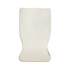 Mirror in brass and in the style of Gio Ponti and the 1980s.