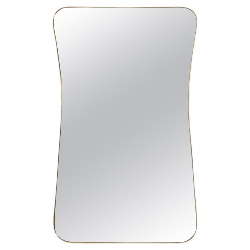 Mirror in brass in the style of Gio Ponti. 1980s/1990s.