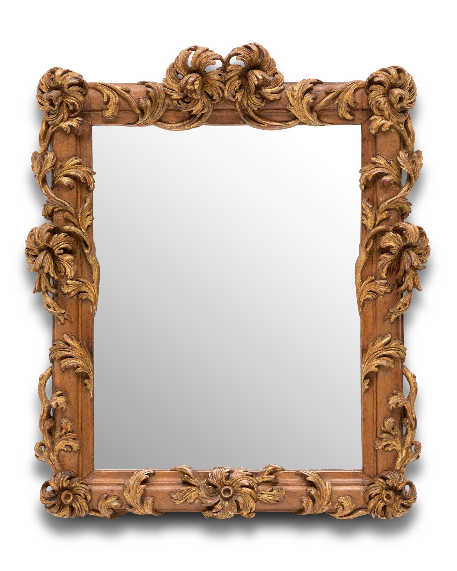 Mirror in carved and partially gilded wood. 19th Century England.