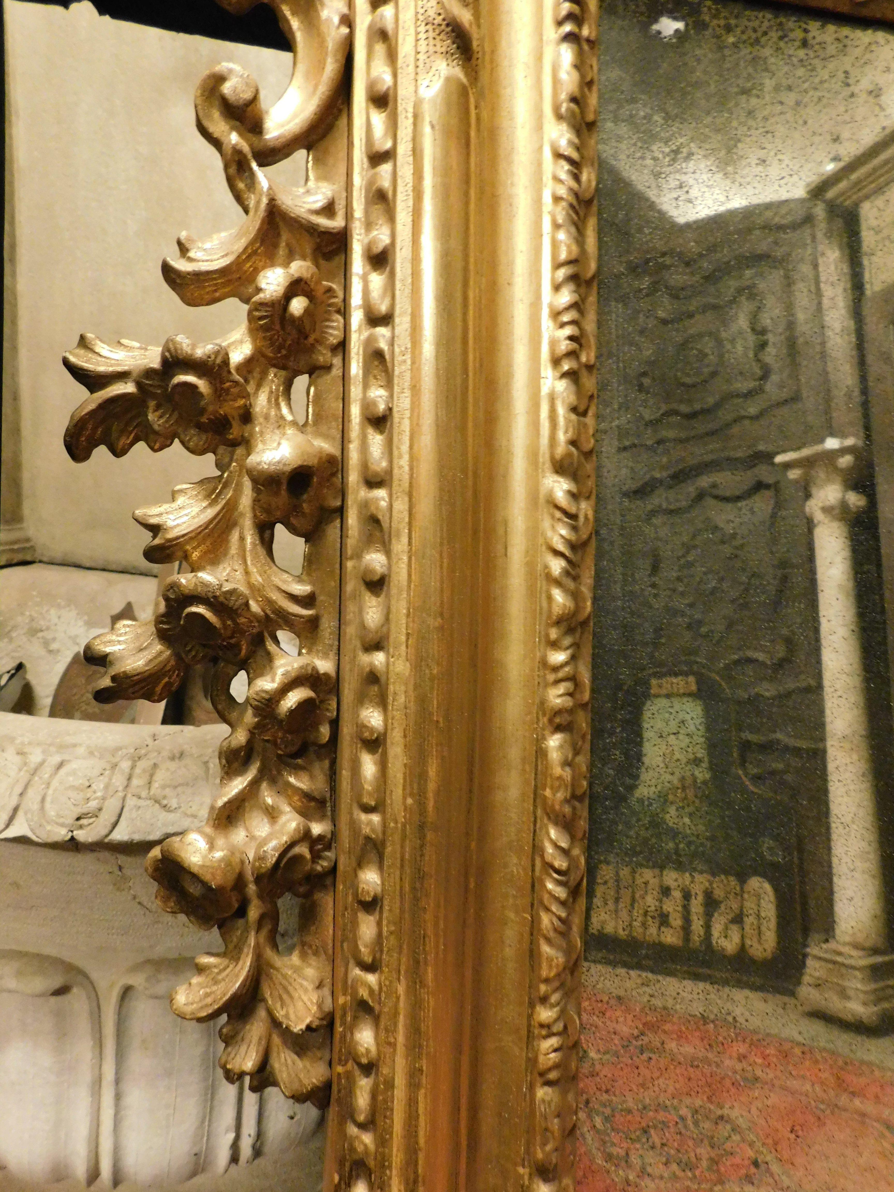 Mirror in gilded wood, richly frieze perforated volutes, floral and leafy, '800 For Sale 6
