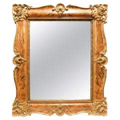 Mirror in lacquered and carved wood with golden shells, Italy