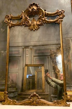 Mirror in lacquered and gilded wood, Italy