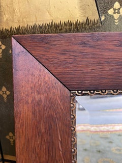 Mirror in oak and antique gilt border