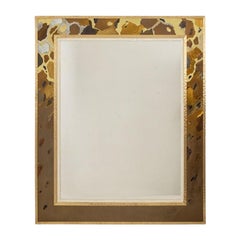 Mirror in oxidized and patinated brass marquetry. Artist’s work.