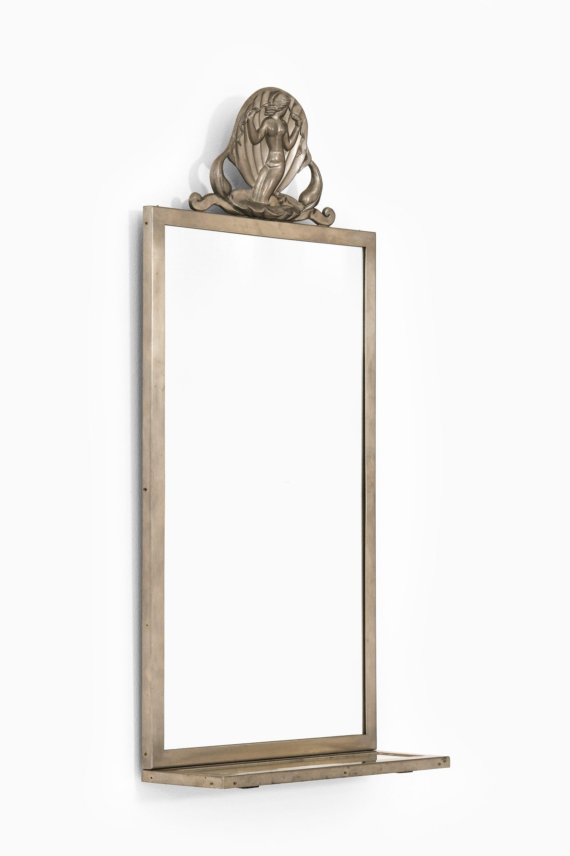 Specchio in peltro di Oscar Antonsson, anni '40

Informazioni aggiuntive:
Materiale: Peltro
Stile: Metà secolo, Scandinavo
Prodotto da Ystad Tenn in Svezia
Dimensioni (L. x P. x H.): 30 x 10,5 x 64,5 cm