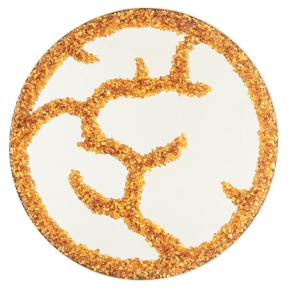 Mirror in semi-precious stones in a circular shape. Artisan work.