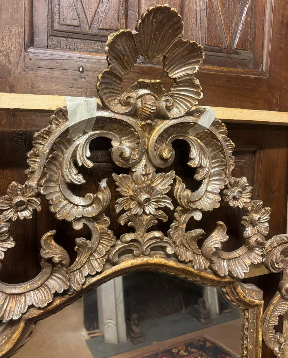 Poplar Mirror in silver lacquered wood, richly carved with open carved top, Italy For Sale