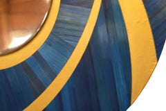 mirror in straw marquetry, center in polished stainless steel, by les2ebenistes