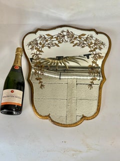 Mirror includes gold leaf