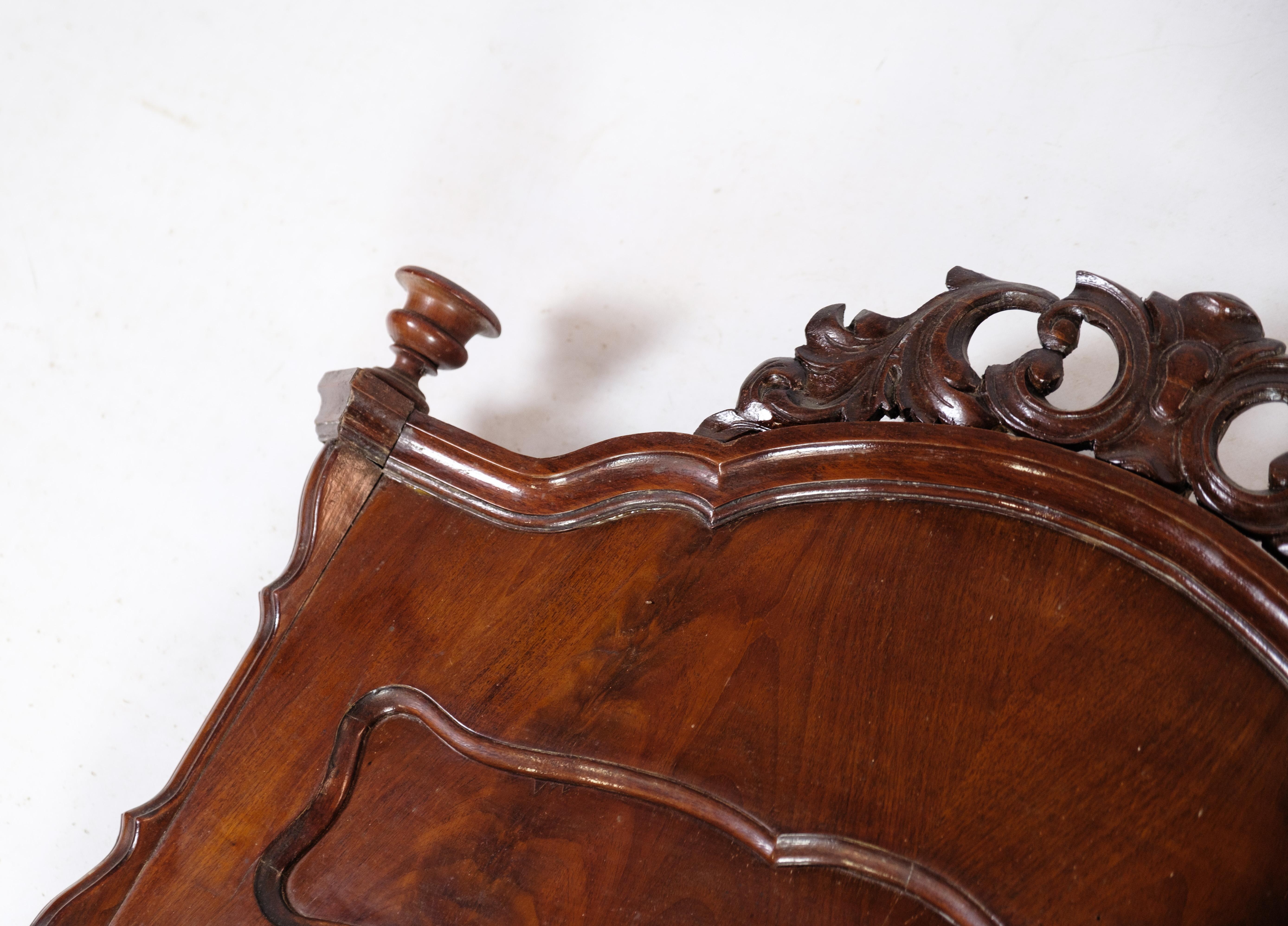 Mirror of hand-polished mahogany, with carvings, made in Denmark from around the 1880s
Dimensions in cm: H:130 W:63.