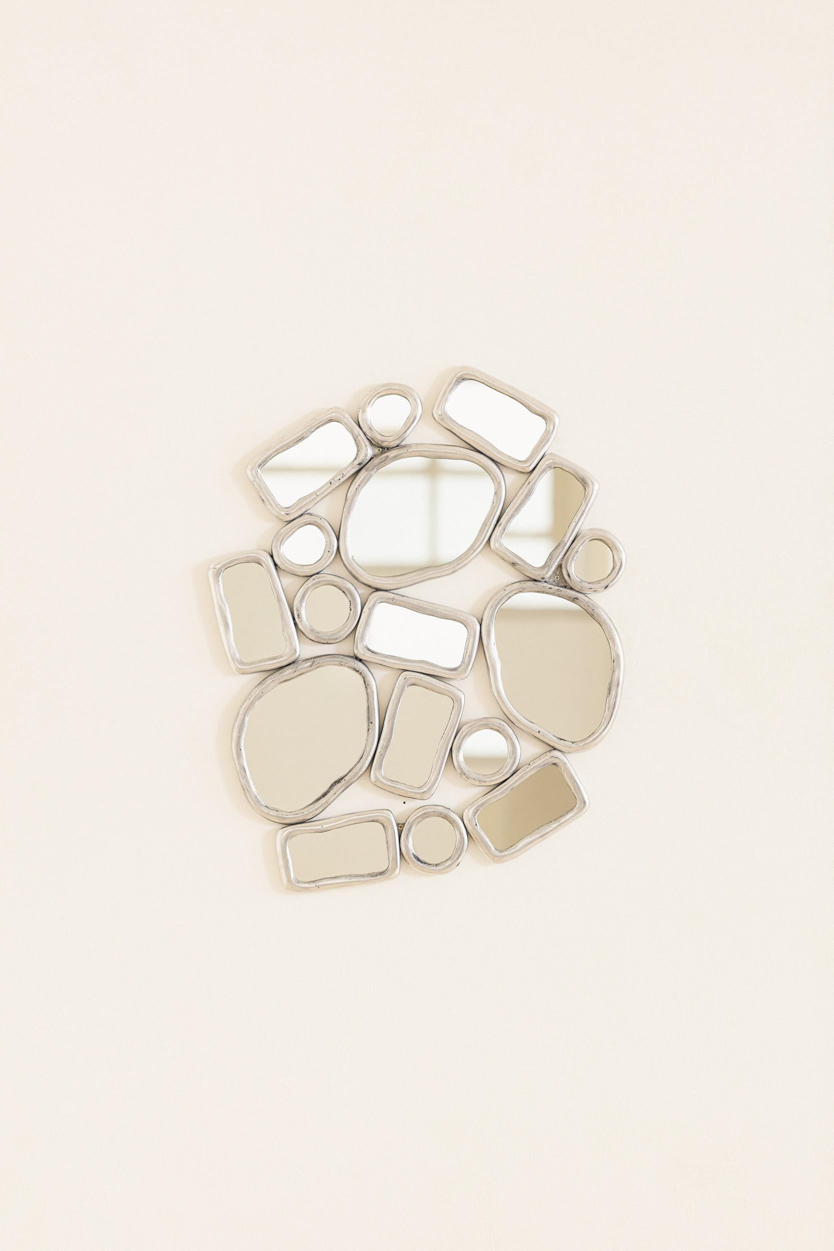 In the collection titled Material Distortion, Recchia reinterprets the historical practice of embedding glass in metal, a technique that dates back to the stained-glass traditions of the early Middle Ages and later found expression in decorative