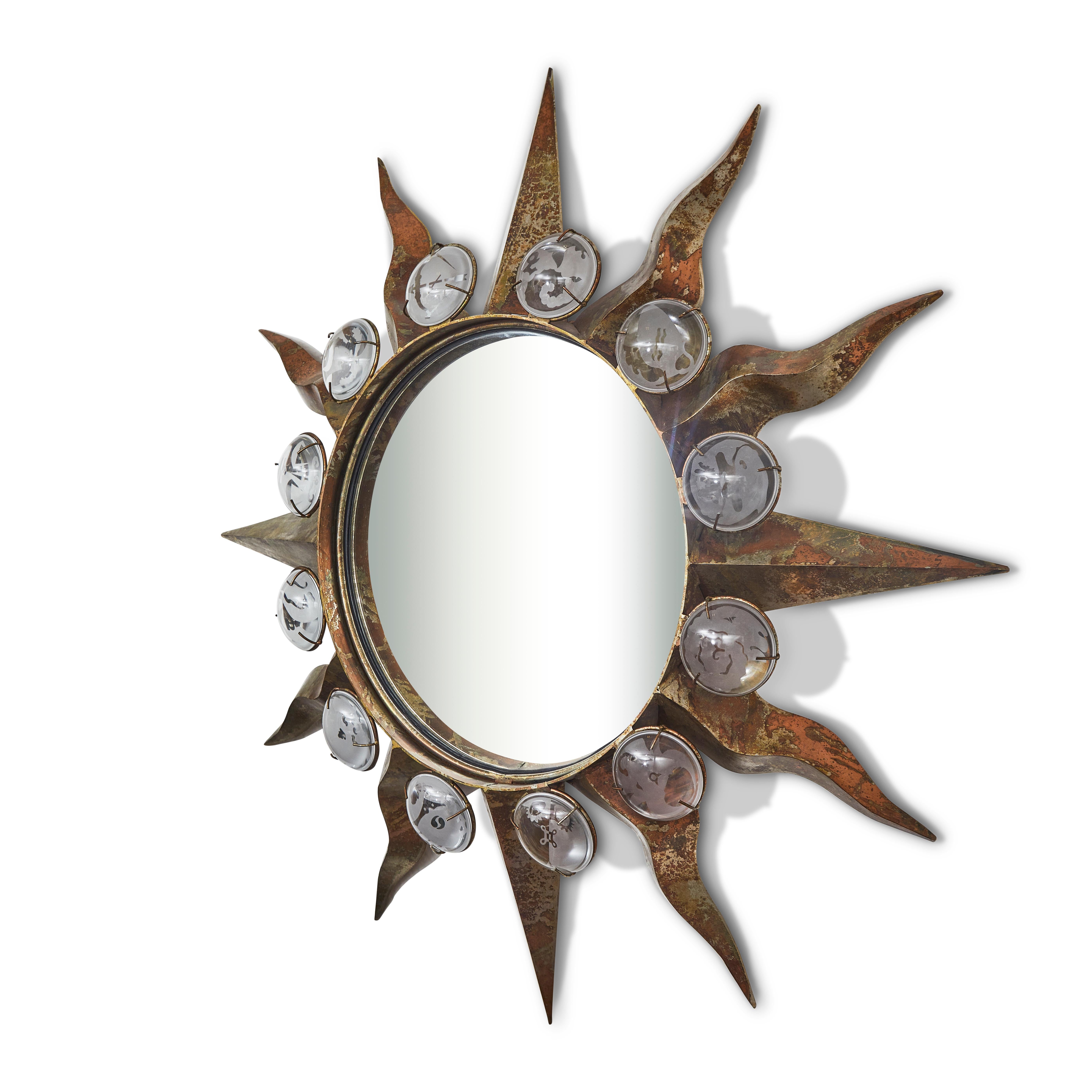 Mirror, Model 'Zodiac' in bronzed patinated steel, mirror and sandblasted glass. The decorative images around the mirror depict the signs of the zodiac. Created by the celebrated Artist and Designer, Mark Brazier-Jones in 1987.
Reference: Charlotte