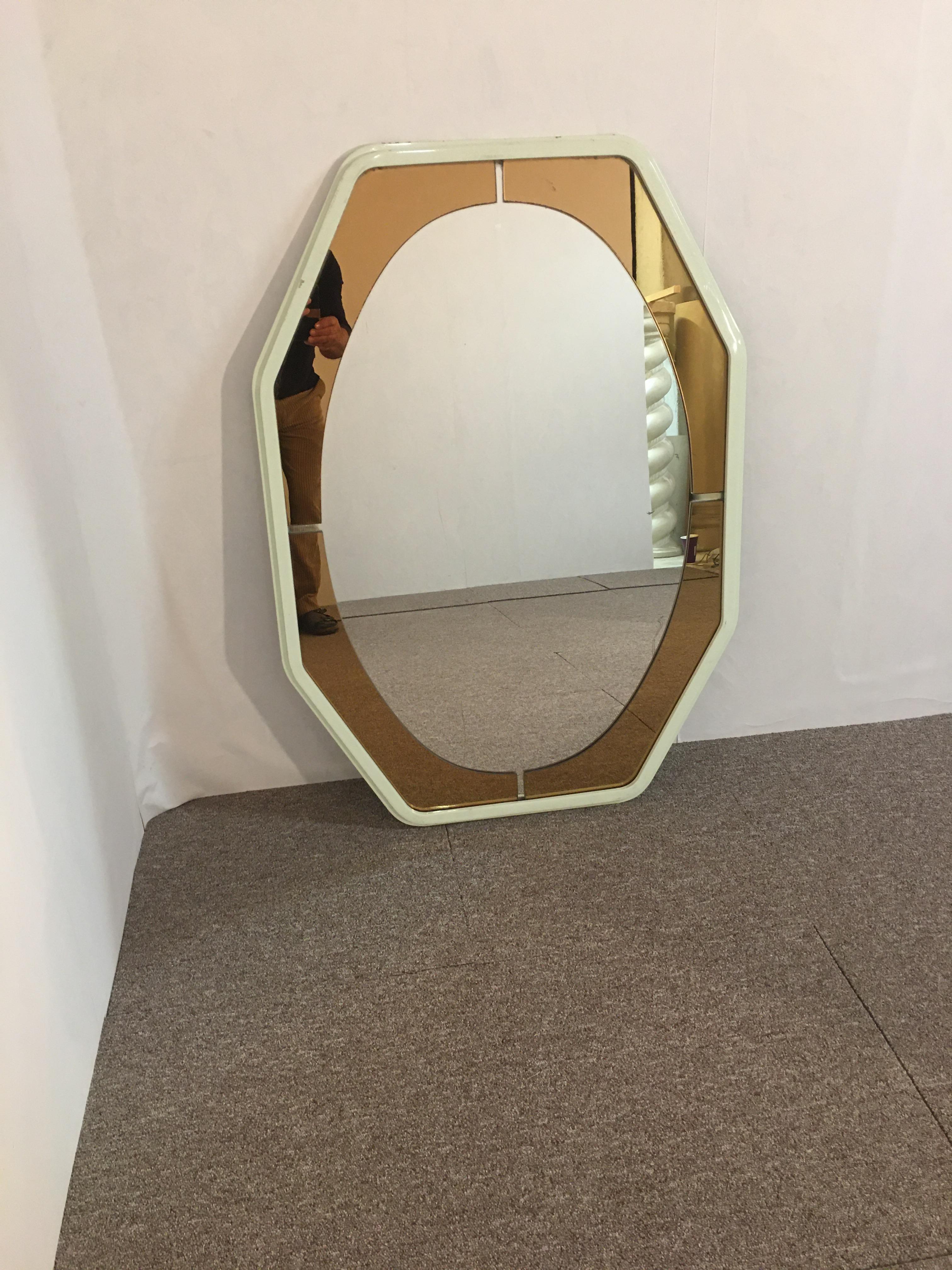 Italian wall mirror from the 70s, Murano, two-tone smoked yellow outline, structure in ivory lacquered metal. Wear of time.
