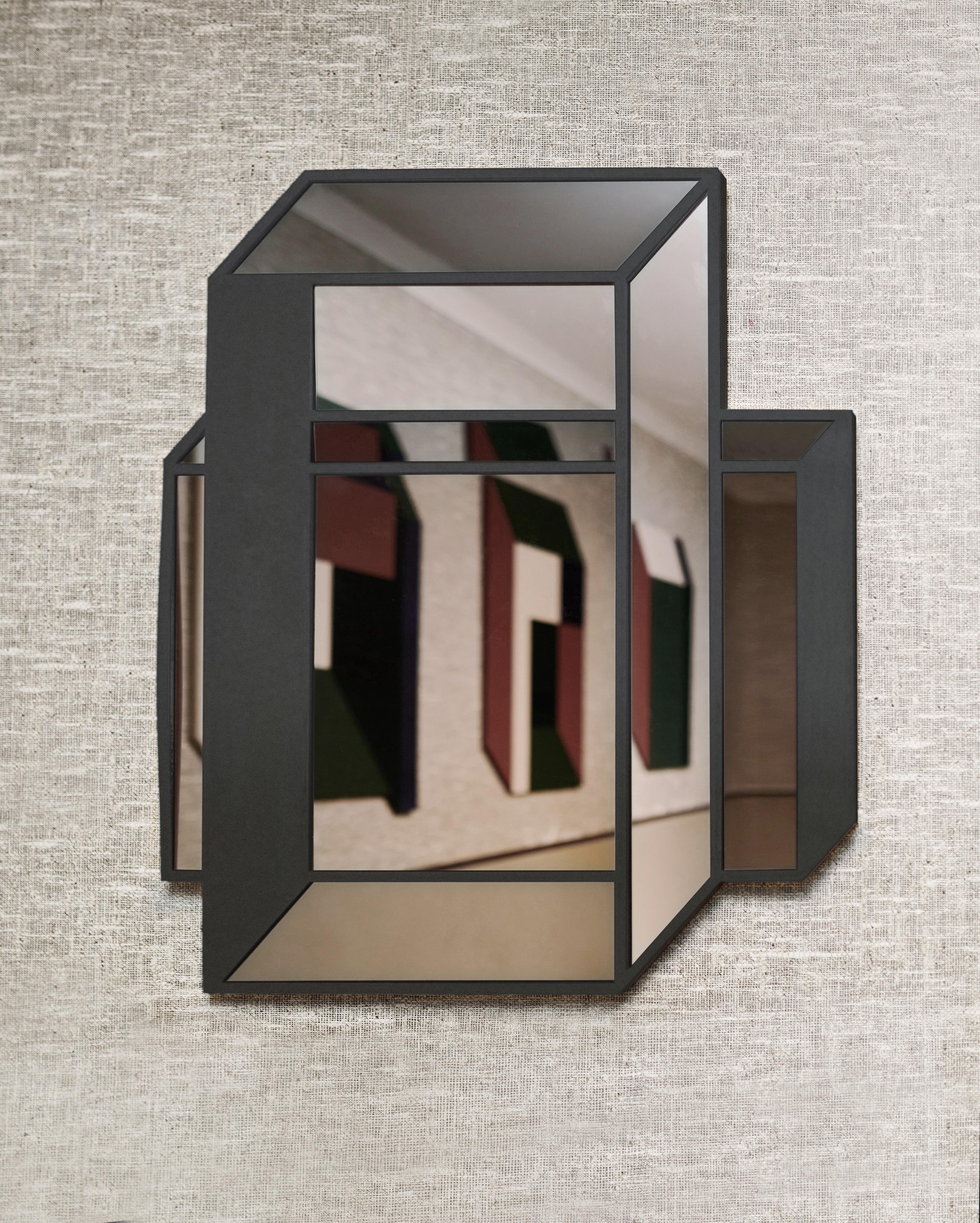 Mirror object No.1 by Dechem Studio.
Dimensions: D 80 x H 95 cm.
Materials: glass, metal.

Axonometric wall mounted mirrors as a symbol of transience and ephemerality translates the three-dimensional relations into a flat surface. Through the