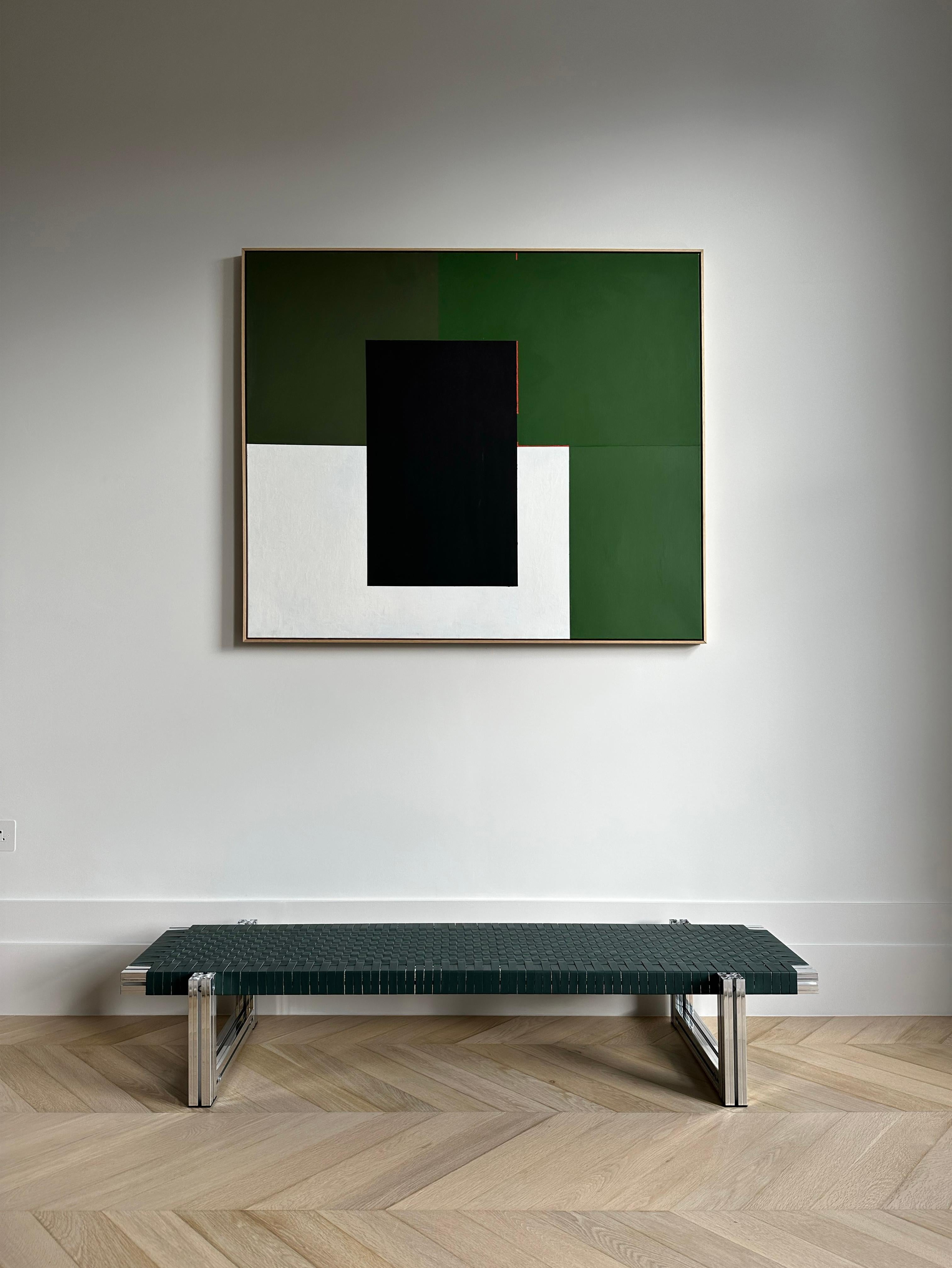 This listing is a special edition with a mirror polished aluminium extrusion structure, where the legs have been moved to the outside, and a seating woven from 20mm wide green leather straps.

Originally realised for the Hepworth Gallery in