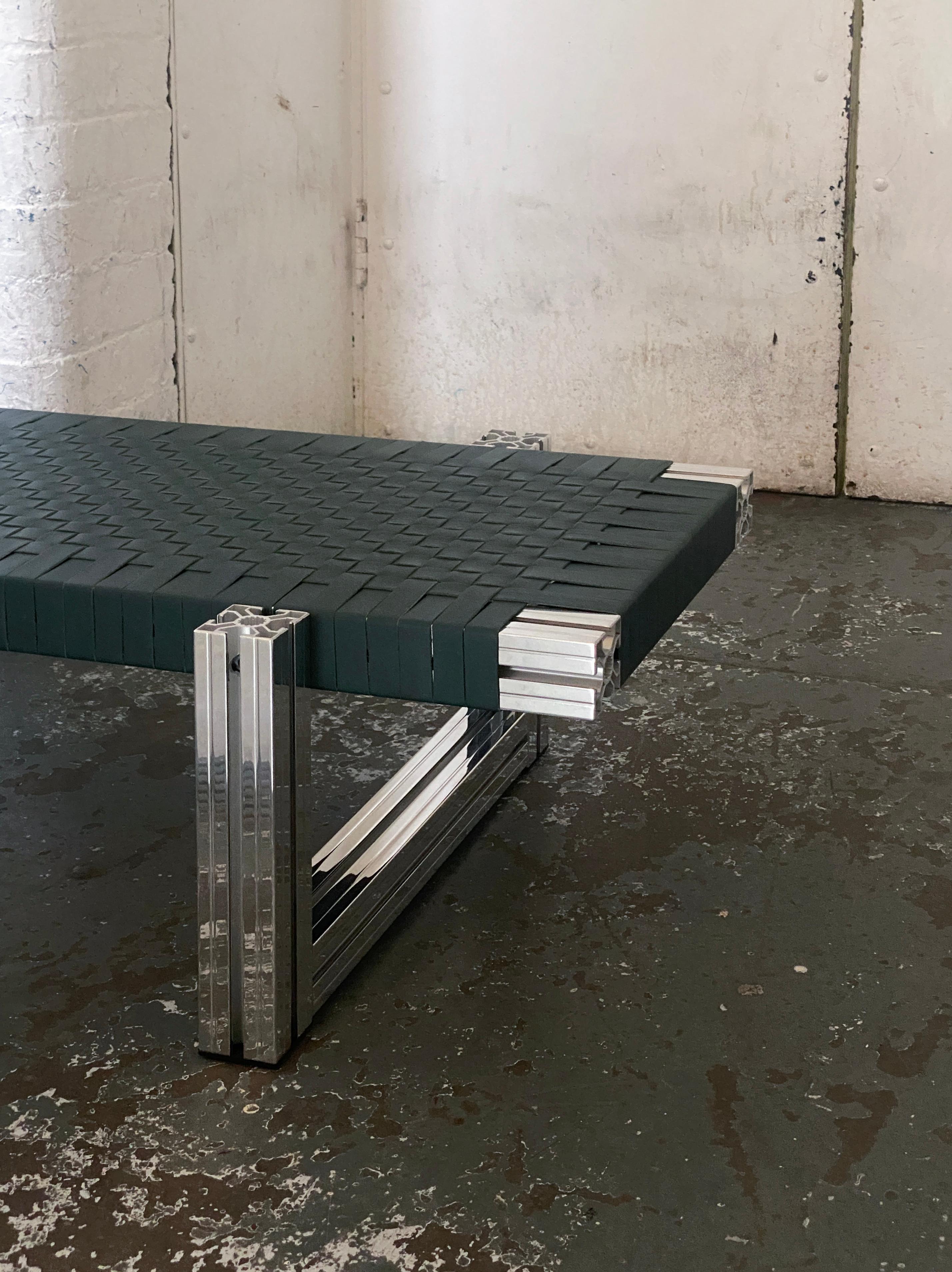 Anodized Mirror Polished Aluminium Bench with Dark Green Leather Webbing Seating For Sale