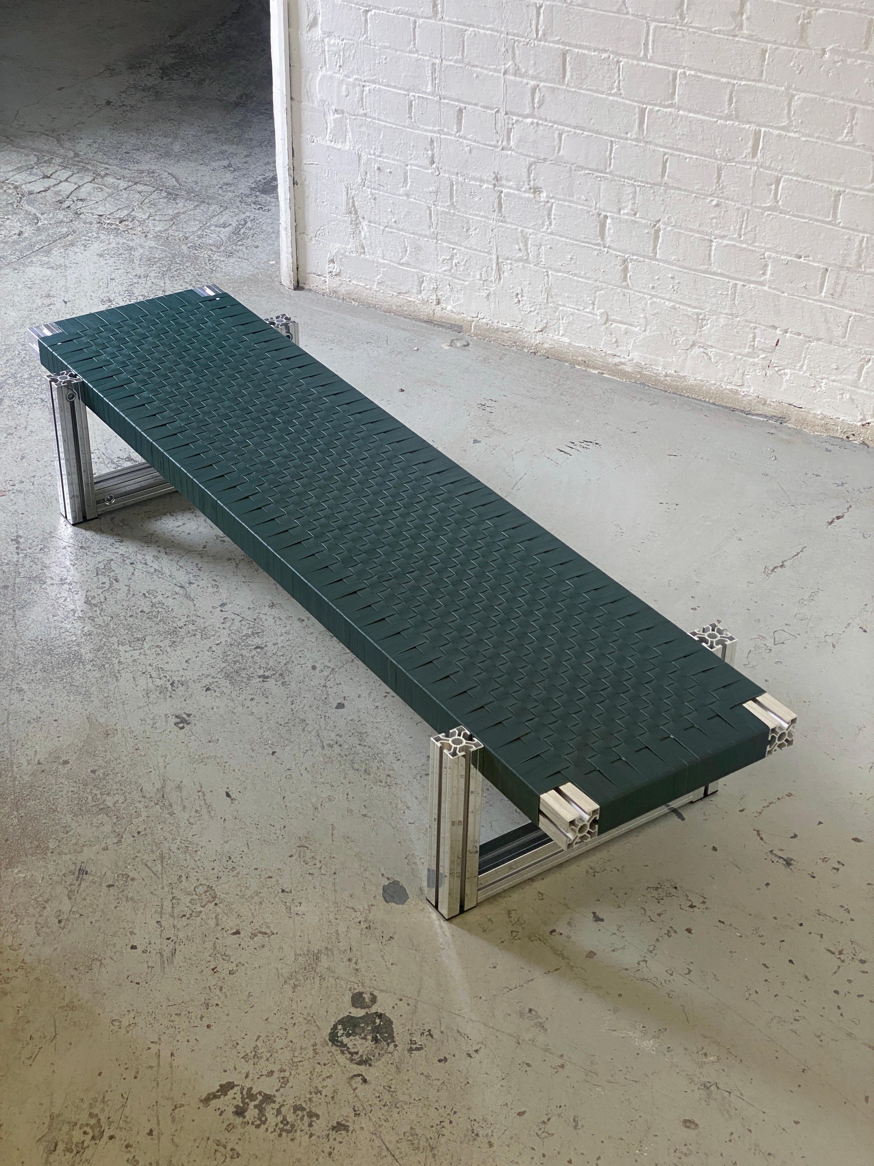 Mirror Polished Aluminium Bench with Dark Green Leather Webbing Seating In New Condition For Sale In London, GB