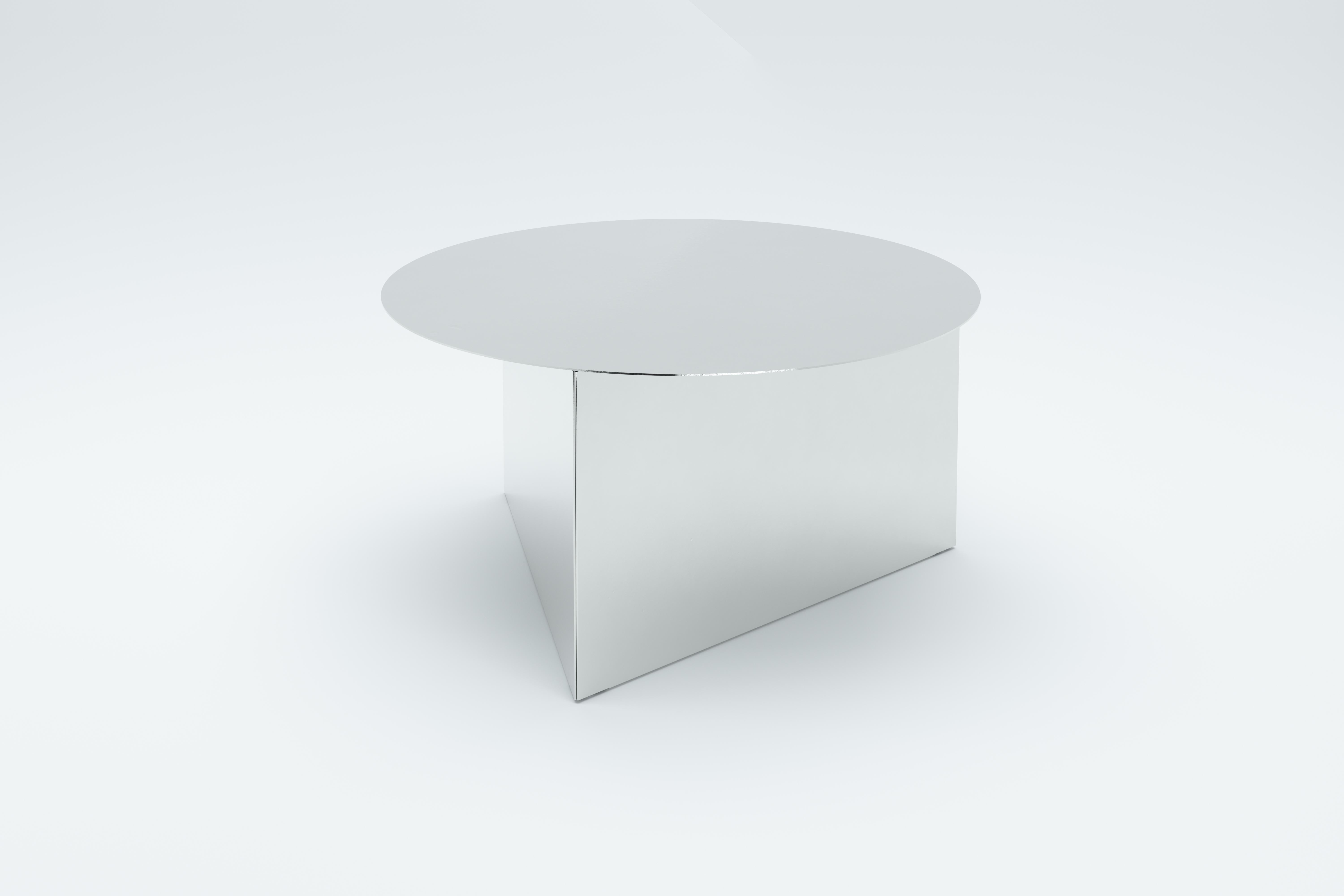 Mirror Prisma circle 70 coffee table by Sebastian Scherer
Dimensions: D 70 x H 35 cm
Materials: Mirror.
Weight: 13.9 kg.
Also available: mirror silver (stainless steel), mirror gold (brass coated stainless steel / mirror black (black coated